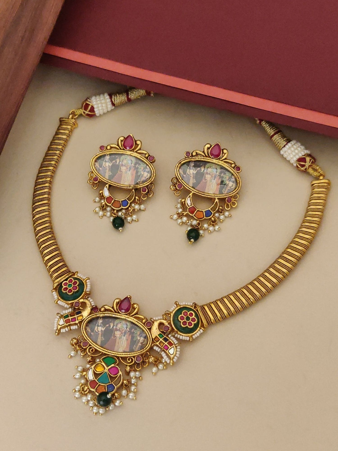 Royal imitation Southindian temple necklace set with gold finish and colorful traditional designs