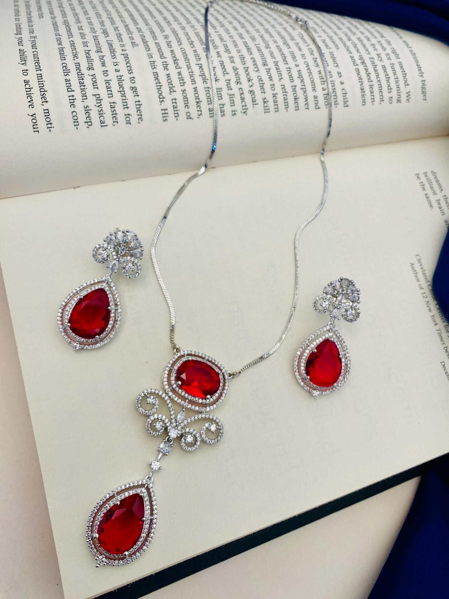 Abdesignsjewellery silver plated ruby pendant set with teardrop red stones crystal halo and matching earrings