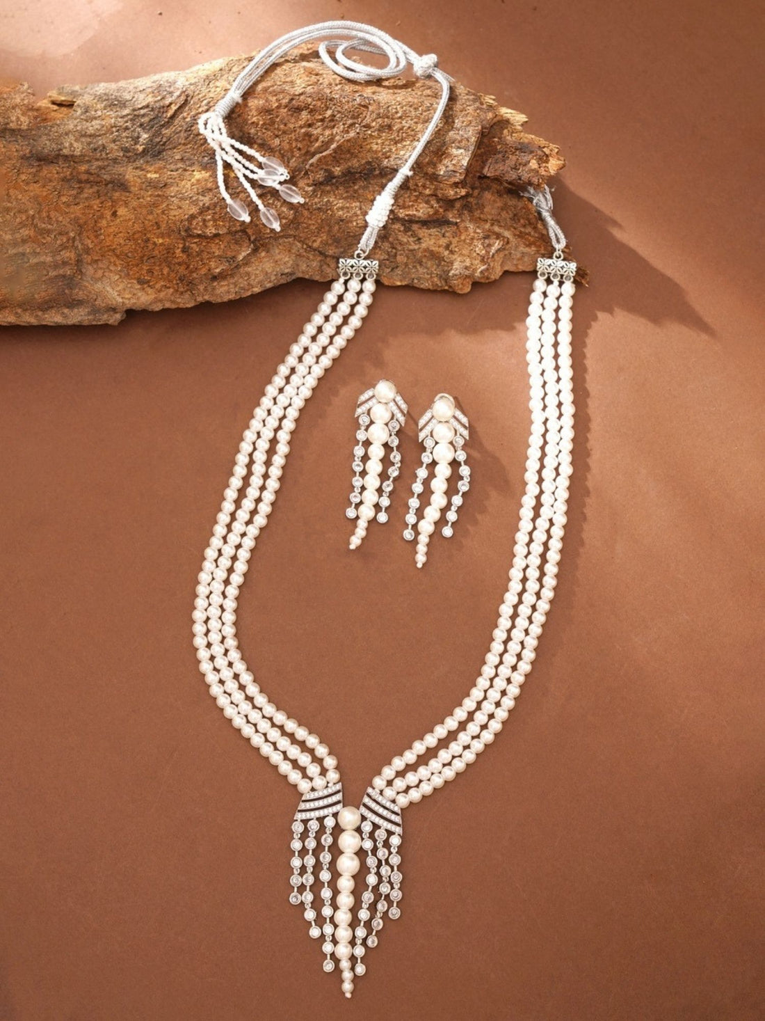 Royal Silver Plated Long Pearl Necklace Set worn by woman with matching pearl earrings