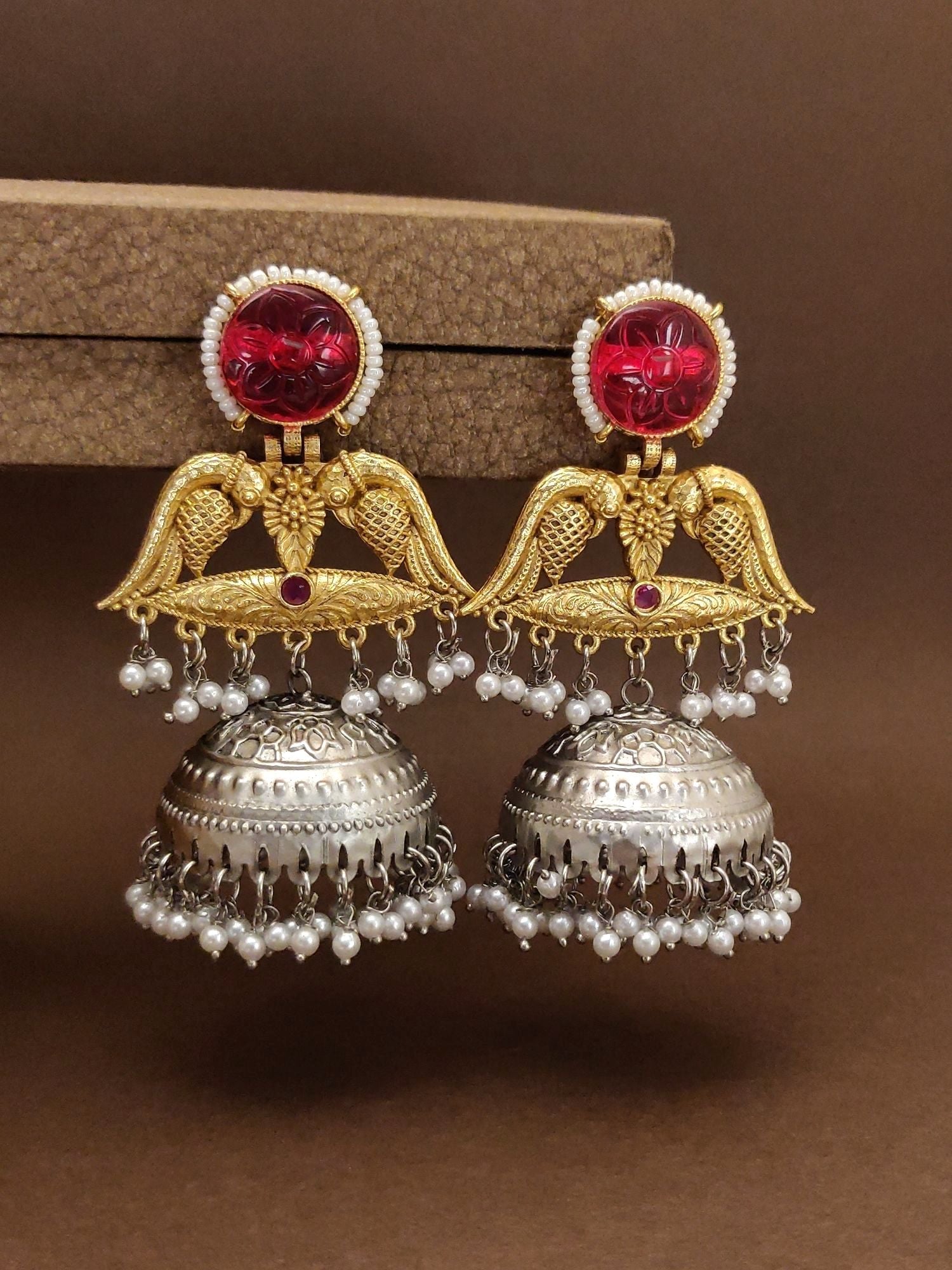 Elegant ruby peacock jhumka earrings with intricate design and pearl detailing for a exotic look