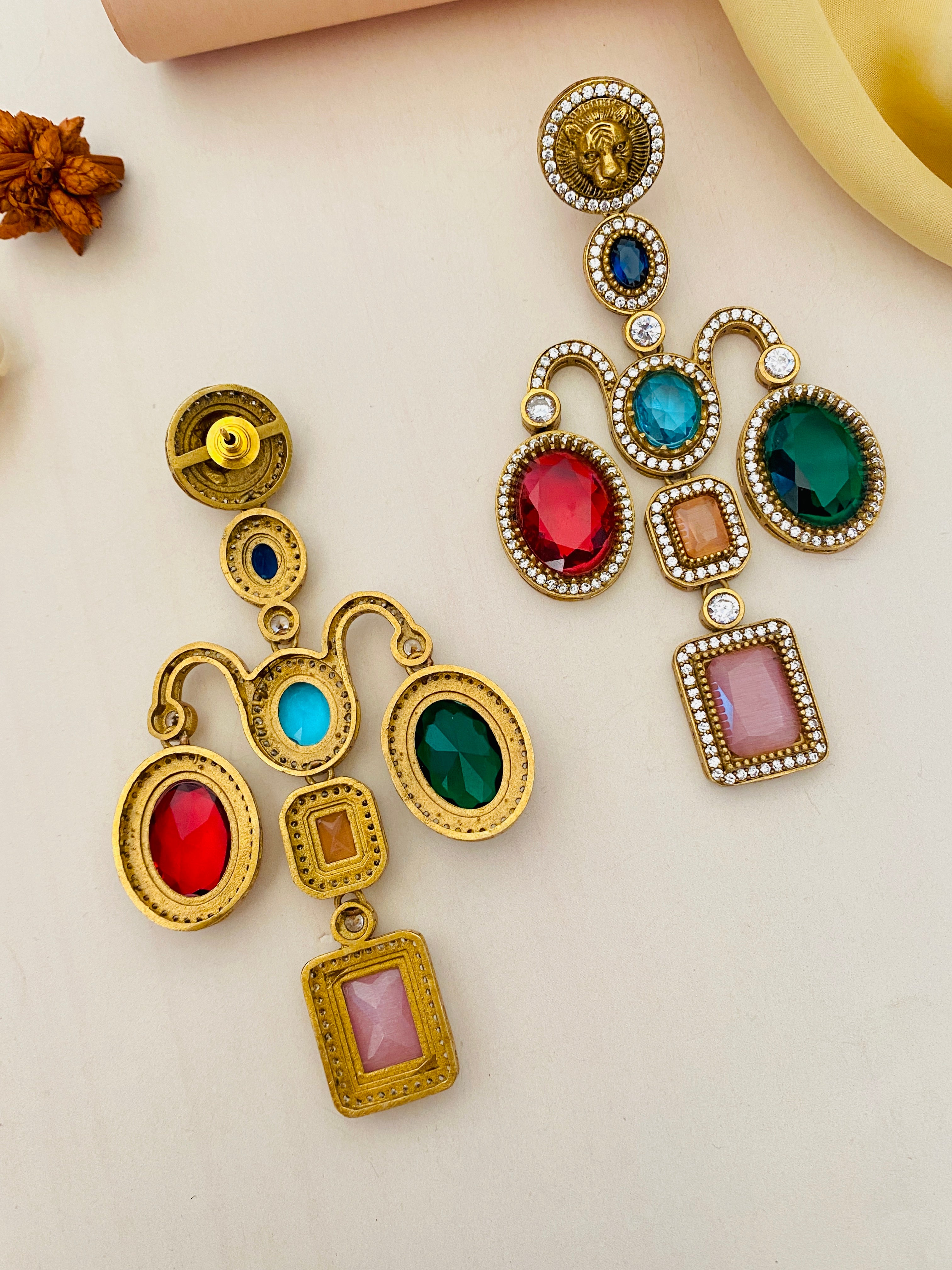 Sabyasachi inspired gold plated earrings by Abdesignsjewellery with colorful gemstones and intricate design