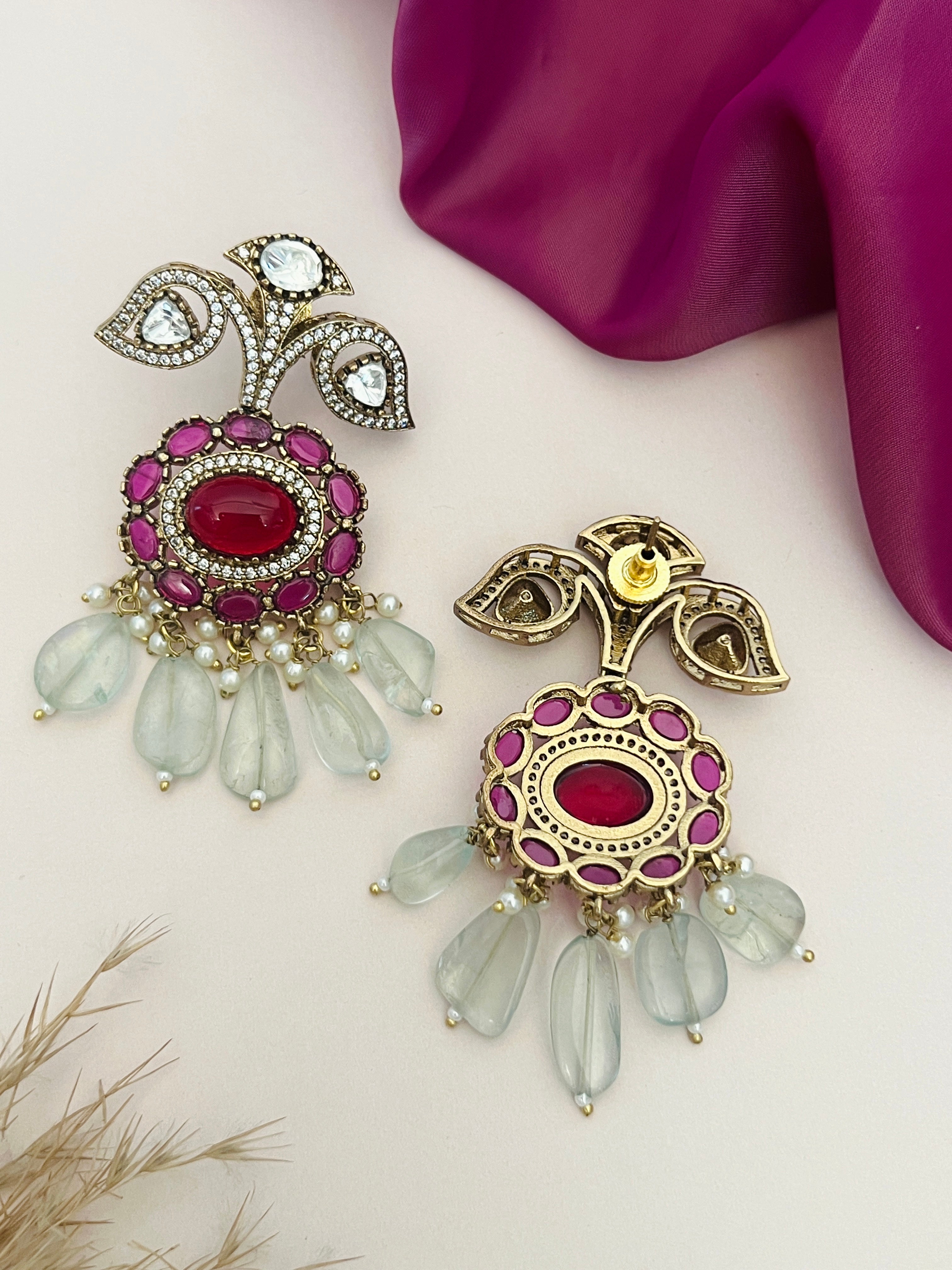 Sabyasachi Inspired Ruby Emerald Multilayer Necklace Set by Abdesignsjewellery with intricate ruby and emerald design