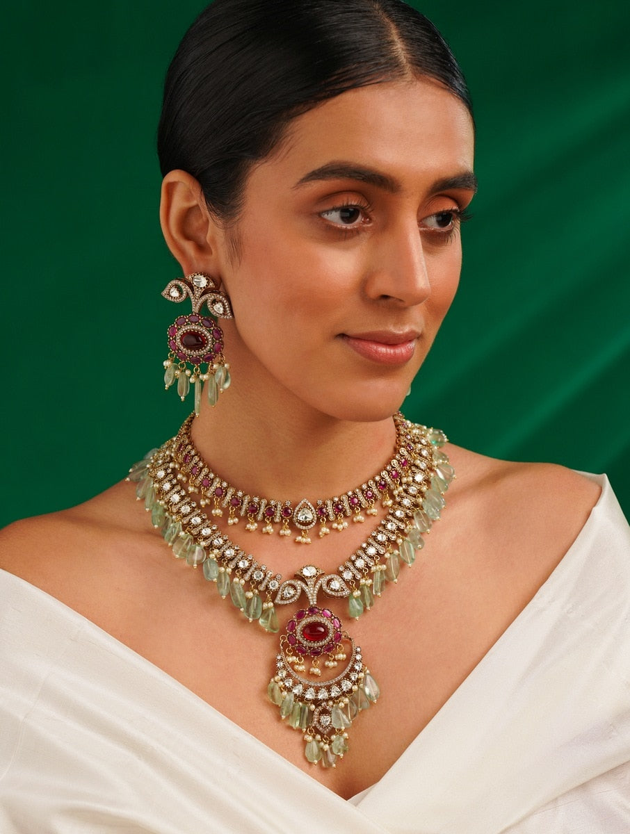 Sabyasachi Inspired Ruby Emerald Multilayer Necklace Set worn by woman with matching earrings