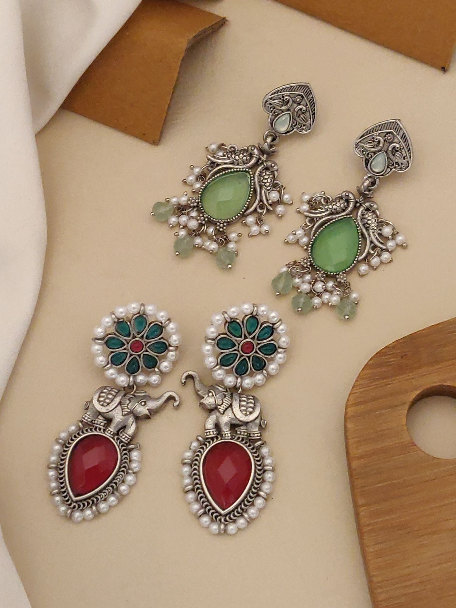 Set of 2 German Silver Earring Combo featuring intricate designs with colorful stones and pearl accents