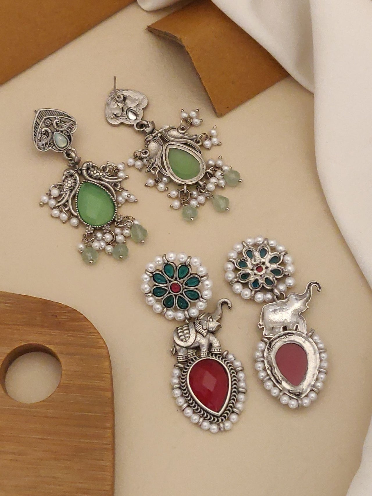 Set of 2 German Silver Earring Combo featuring intricate designs with green and red accents