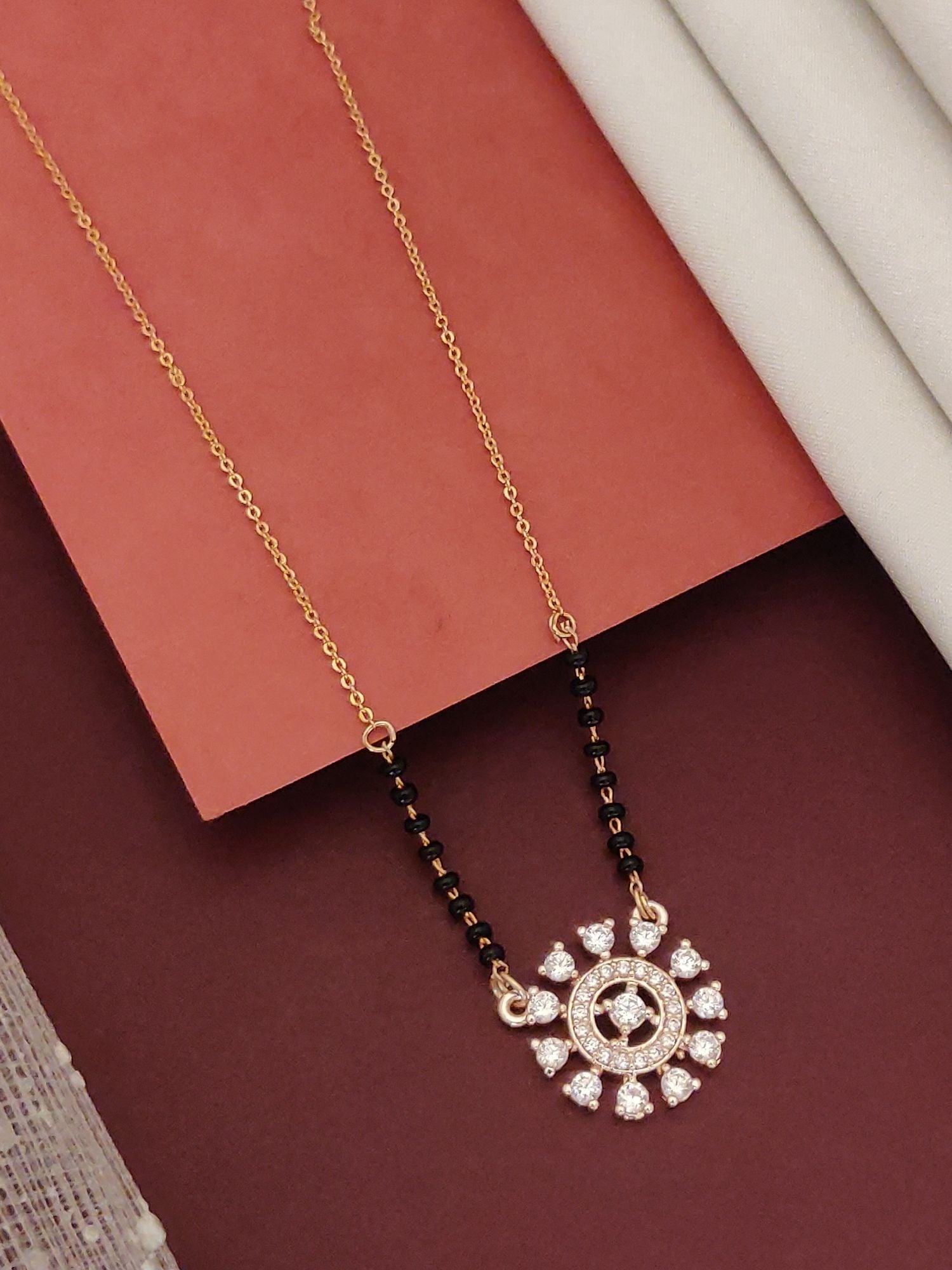 Abdesignsjewellery mangalsutra with black beads gold chain and floral diamond pendant buy glamorous mangalsutra jewelry