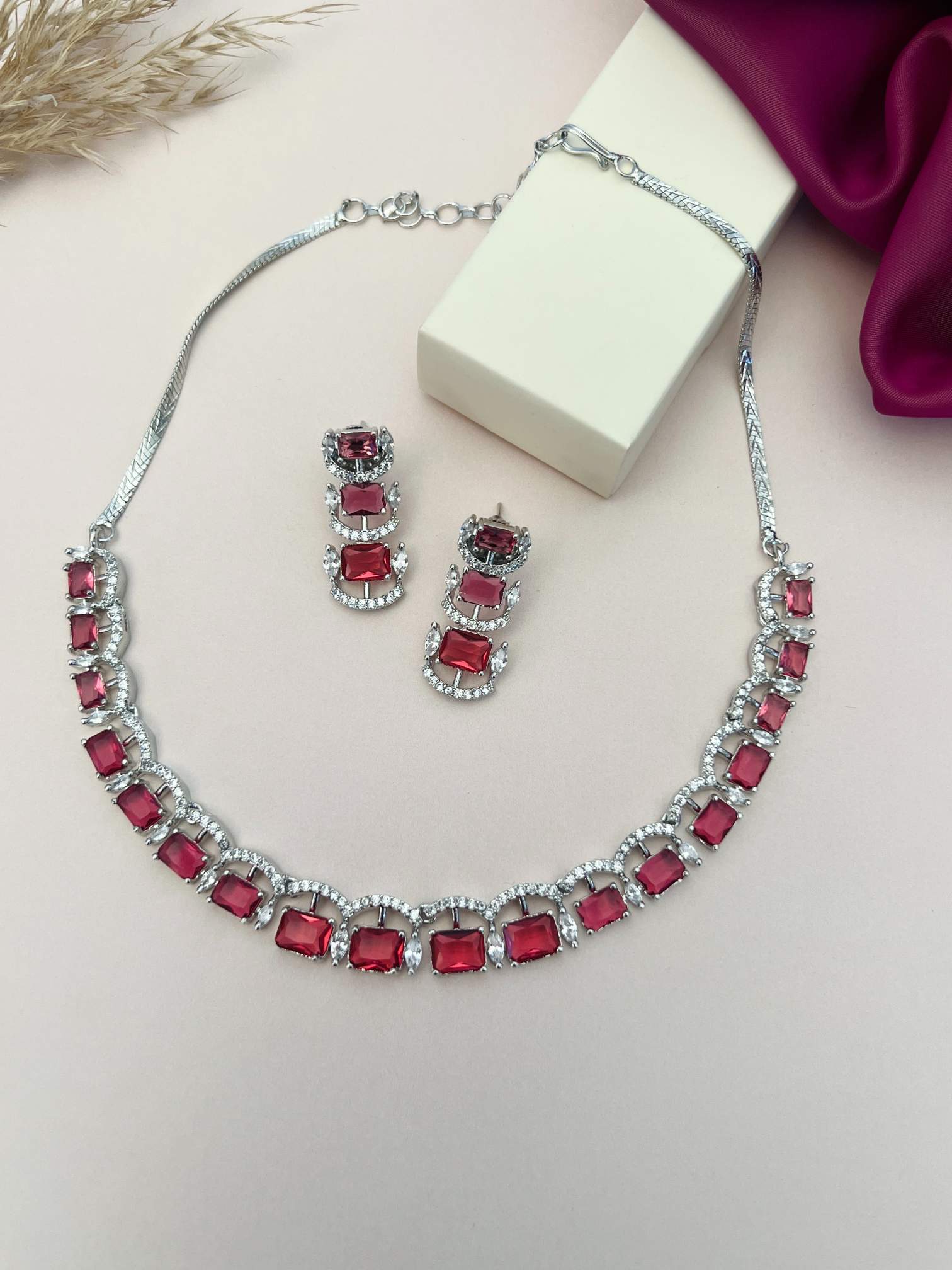 Silver American Diamond Necklace Set with red rectangular stones and matching earrings by Abdesignsjewellery