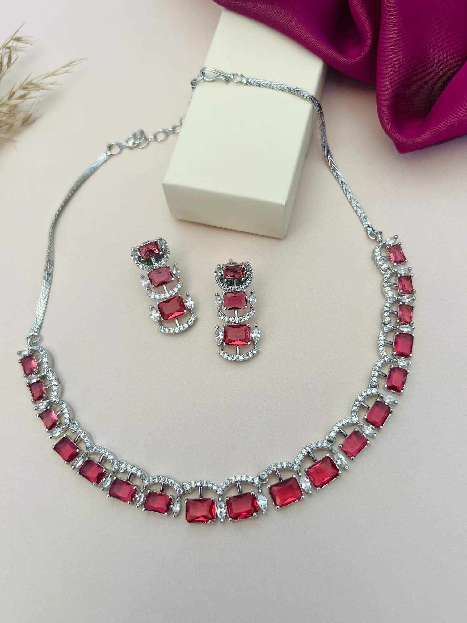 Silver American Diamond Necklace Set with red stones and matching earrings by Abdesignsjewellery