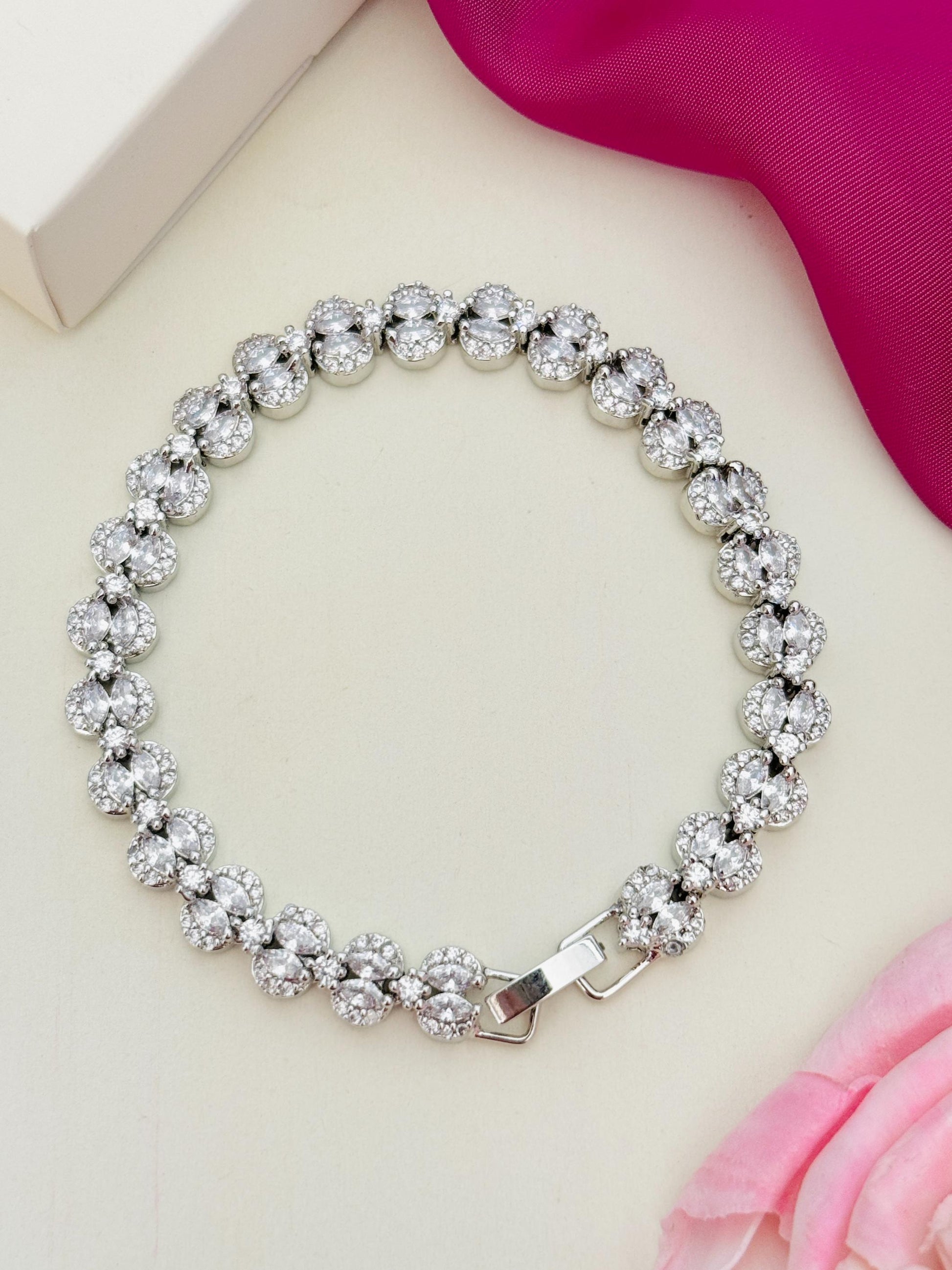 Silver Plated American Diamond Bracelet by Abdesignsjewellery with round sparkling stones in floral design