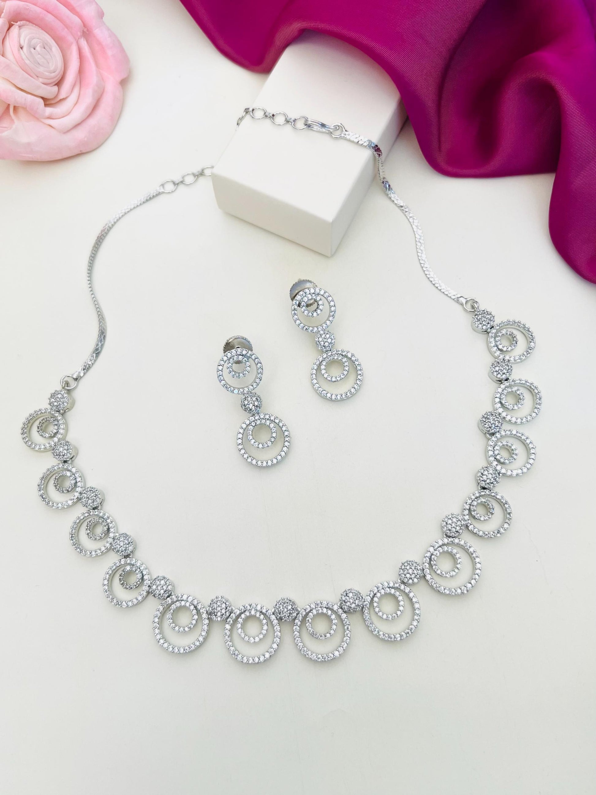 Silver Plated American Diamond Chocker Necklace Set with intricate circular designs and matching earrings