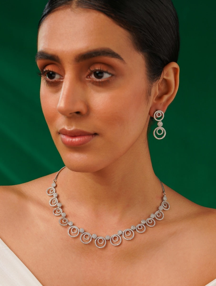 Silver Plated American Diamond Chocker Necklace Set by Abdesignsjewellery worn by woman with matching earrings