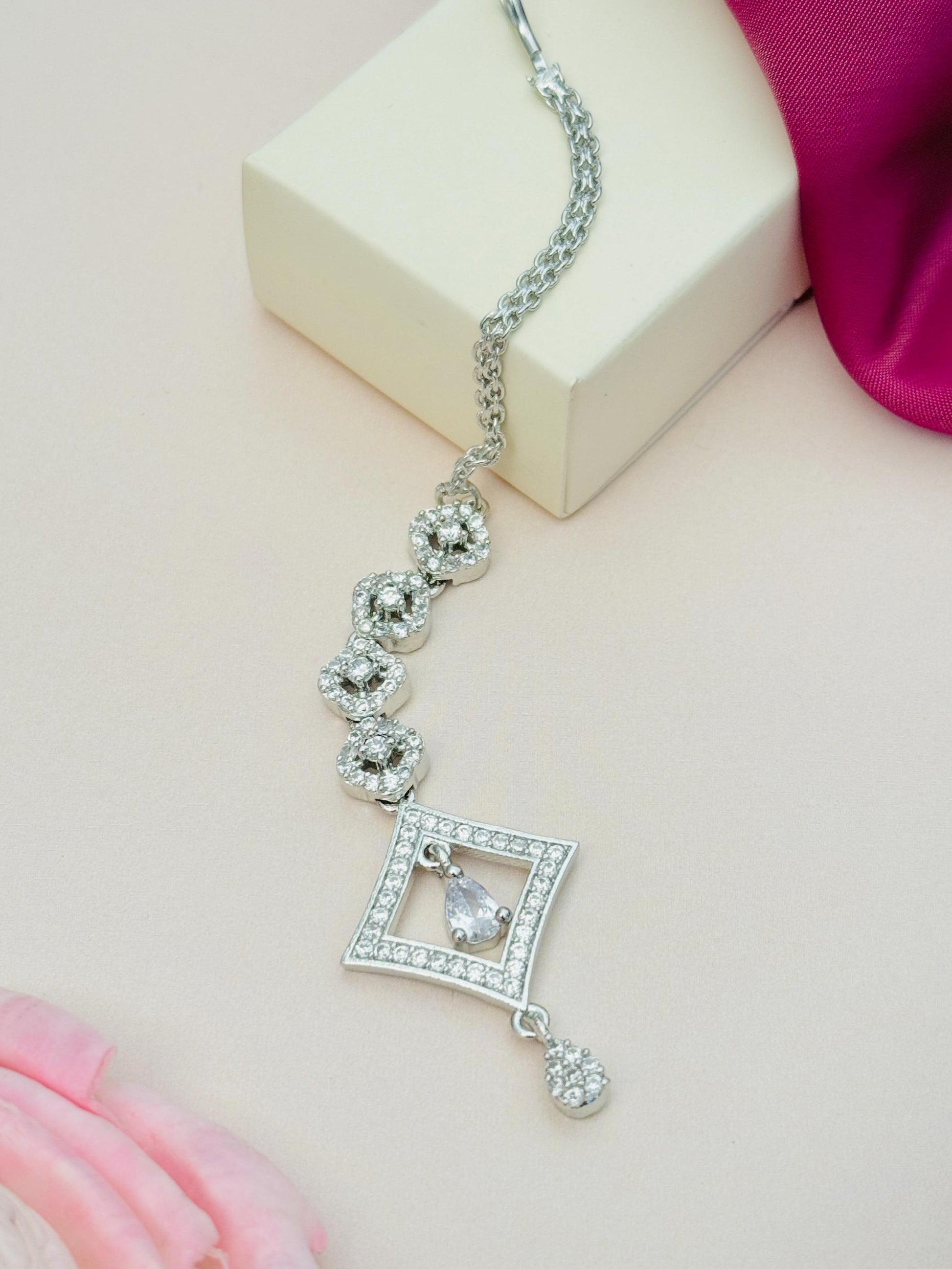 Silver Plated American Diamond Maangtikka with intricate floral and geometric design by Abdesignsjewellery