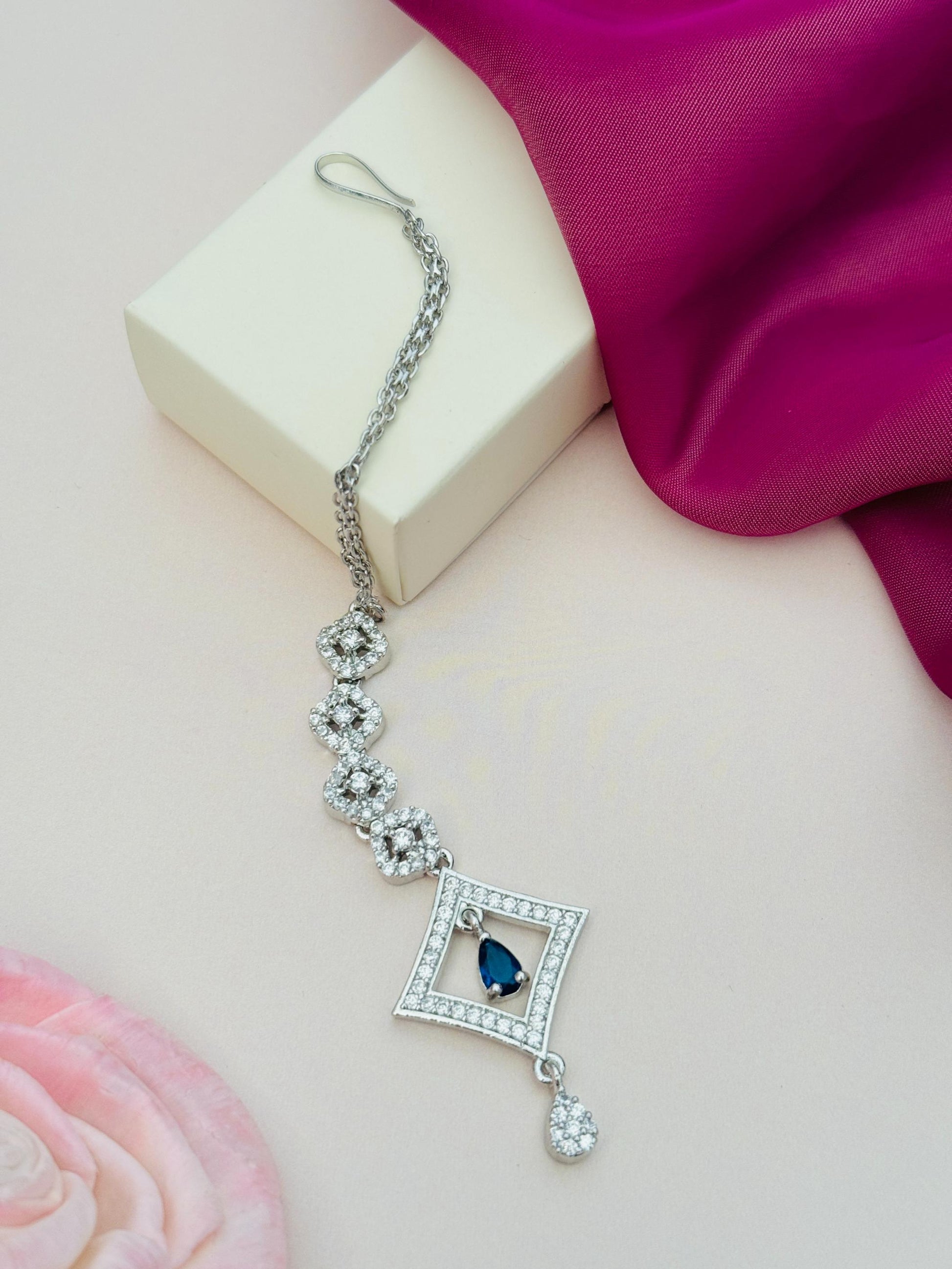 Silver Plated American Diamond Maangtikka with blue stone and intricate chain by Abdesignsjewellery