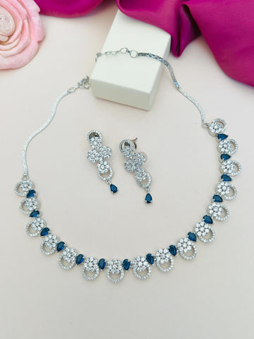 Silver Plated American Diamond Necklace with matching earrings featuring blue teardrop stones by Abdesignsjewellery