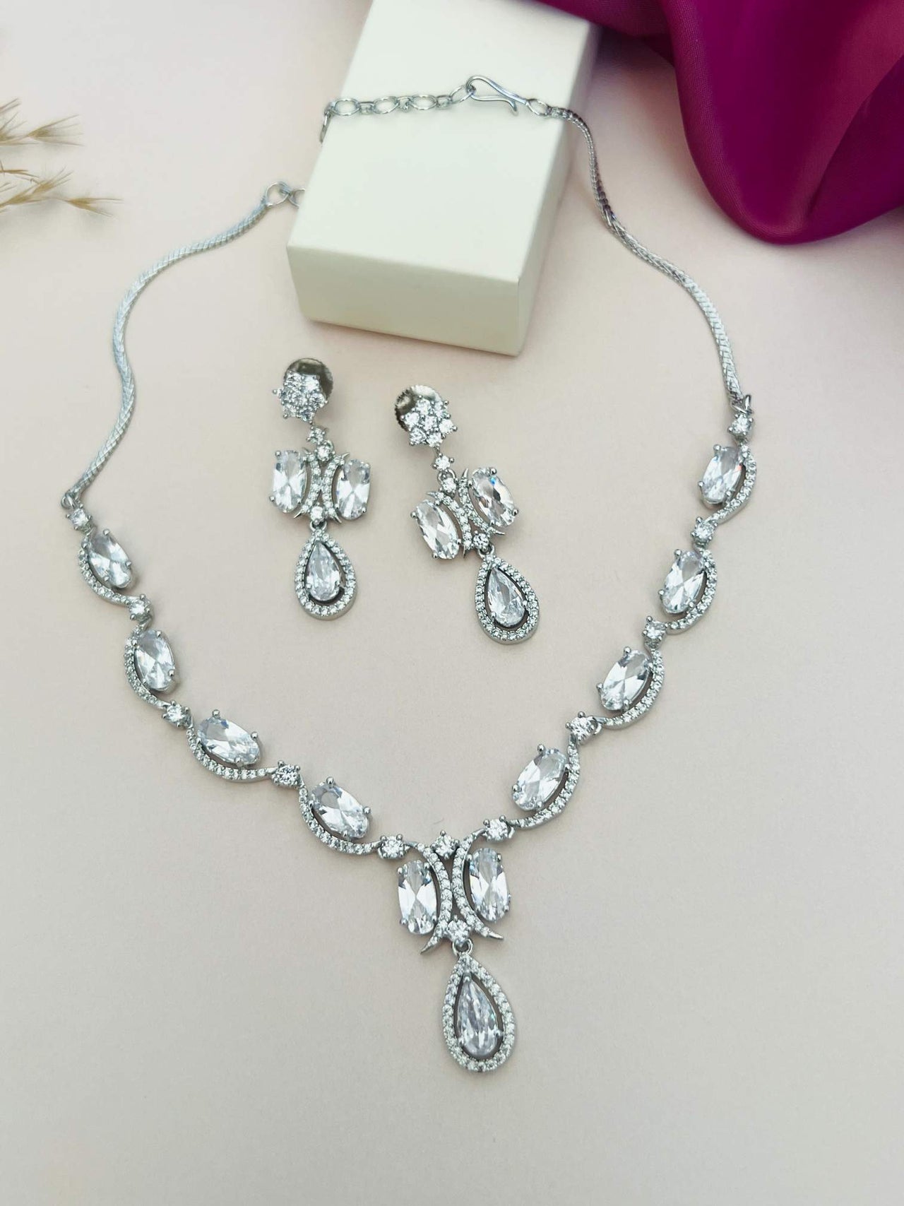 Silver Plated American Diamond Necklace with matching earrings by Abdesignsjewellery on display