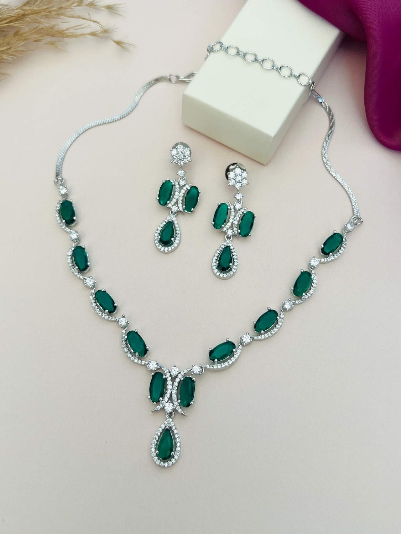 Silver Plated American Diamond Necklace with green gemstones and matching earrings from Abdesignsjewellery