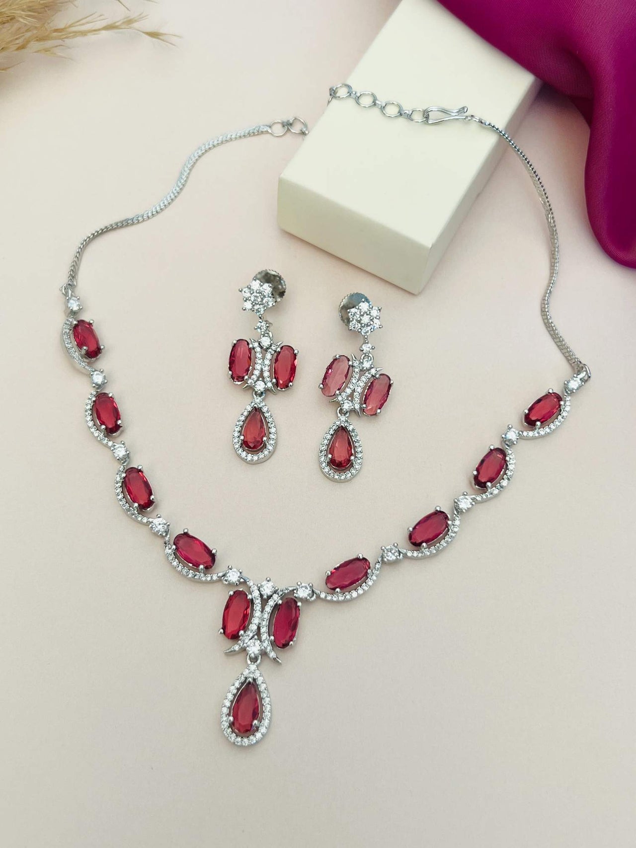 Silver Plated American Diamond Necklace with matching red gemstone earrings from Abdesignsjewellery