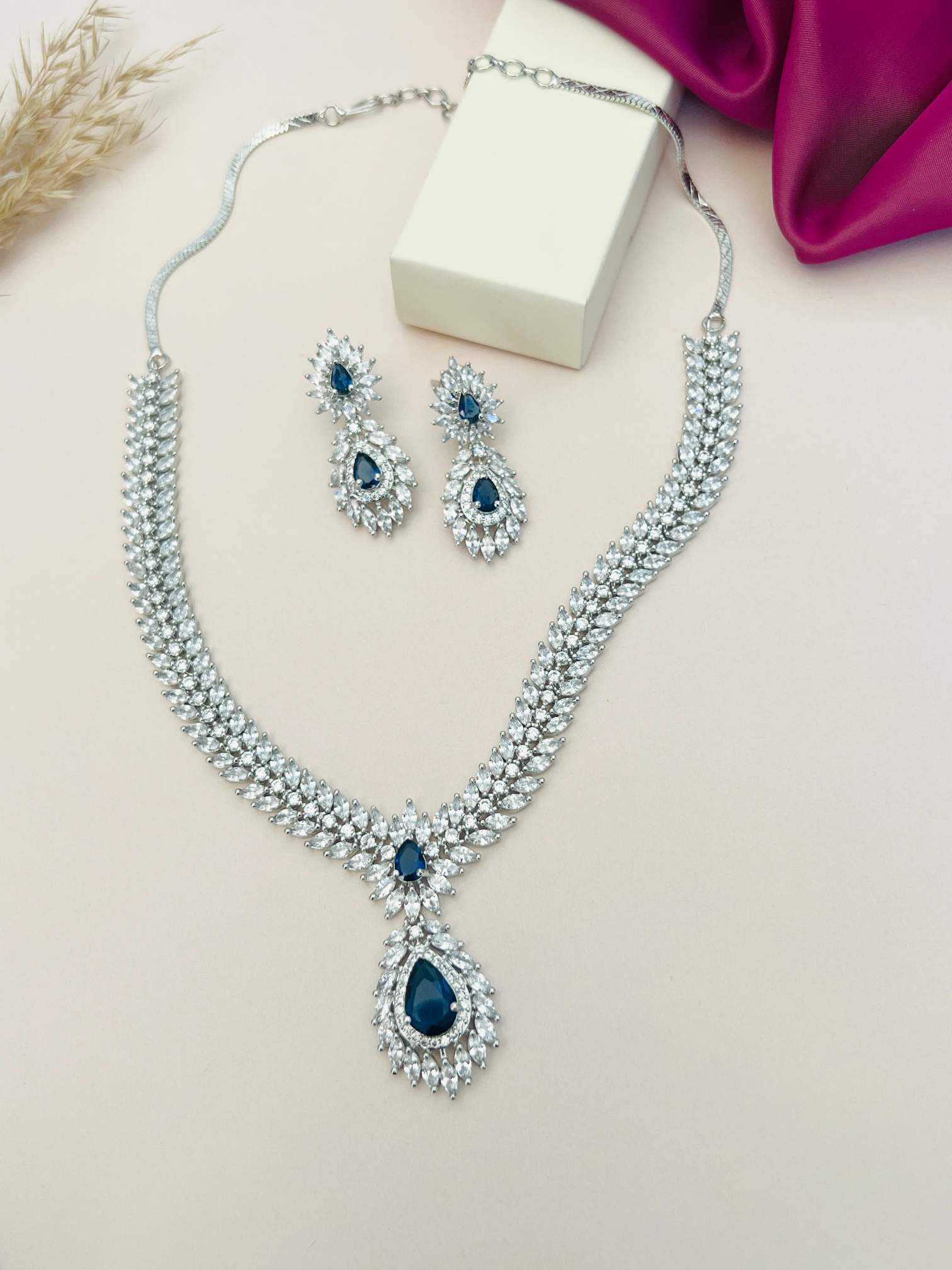 Silver Plated American Diamond Necklace Set with blue teardrop stones and matching earrings by Abdesignsjewellery