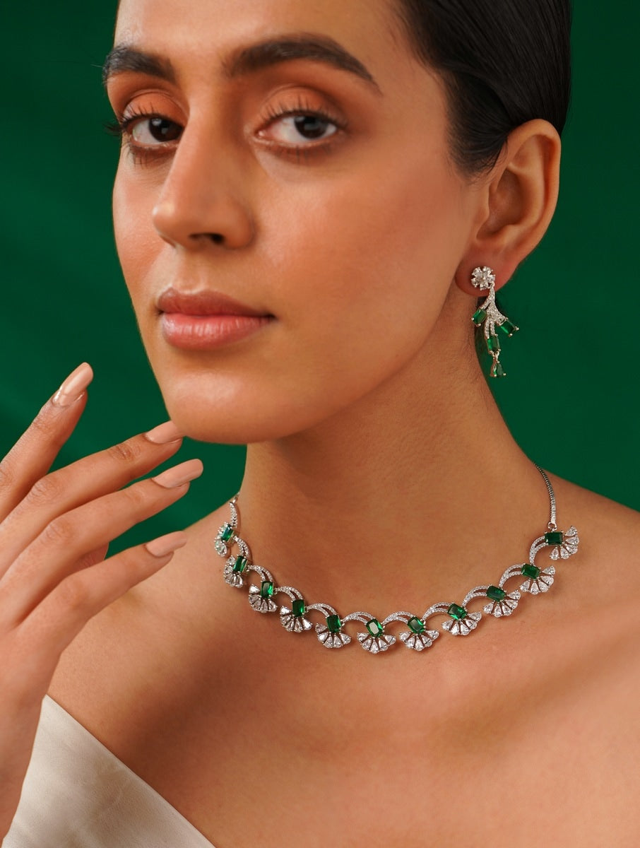 Silver Plated American Diamond Necklace Set with floral design worn by woman with matching earrings