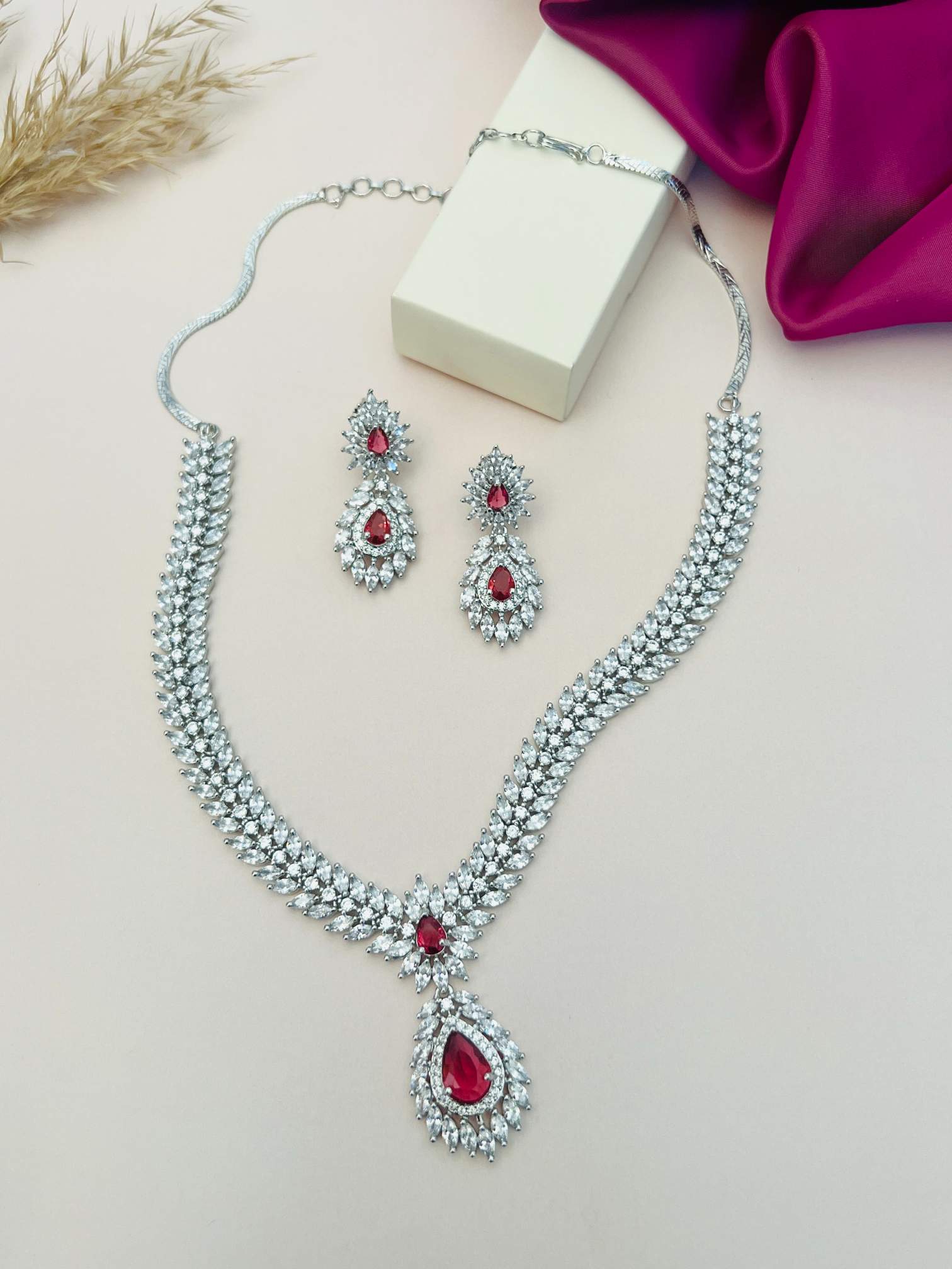 Silver Plated American Diamond Necklace Set with red gemstones and matching earrings 
