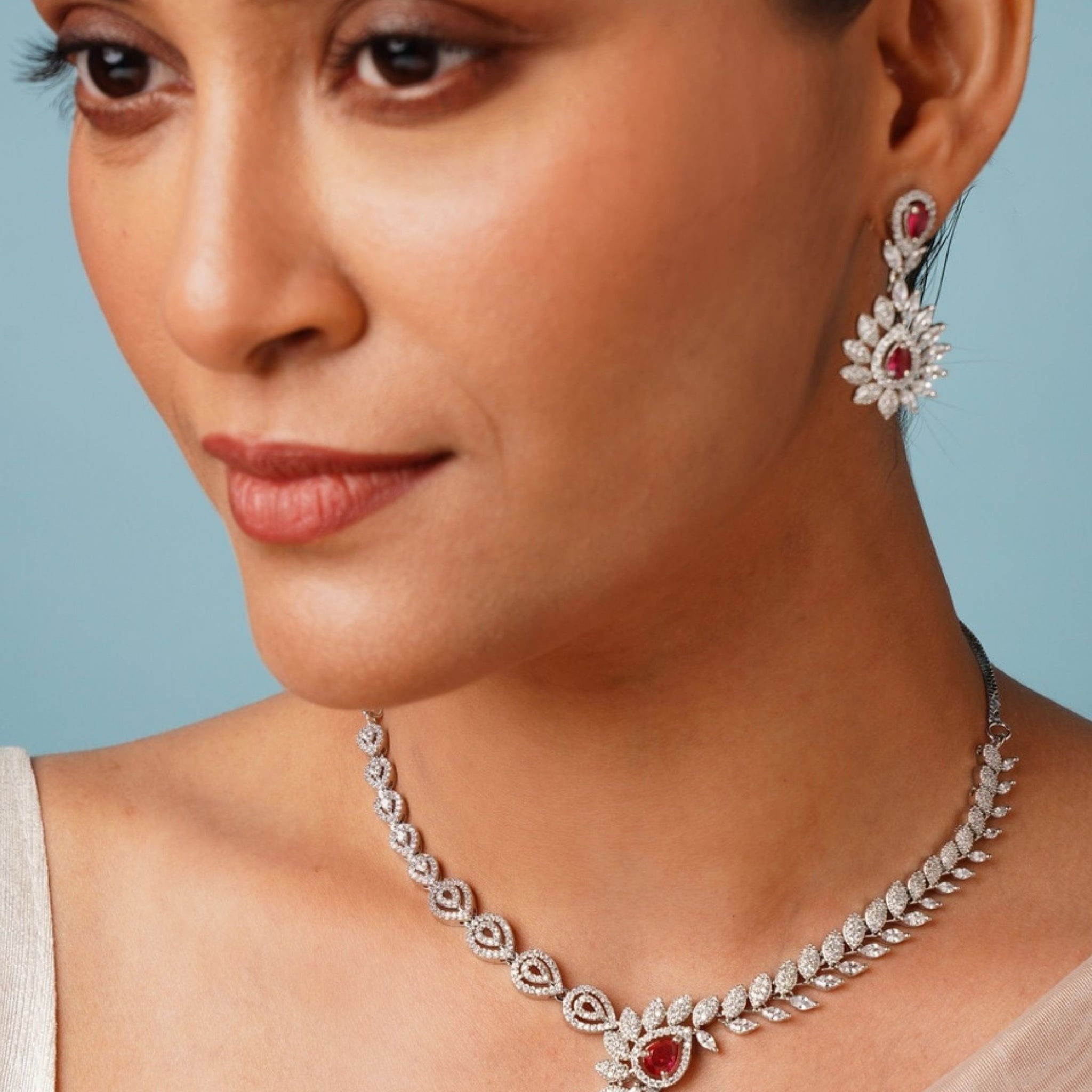 Silver Plated American Diamond Necklace Set worn by woman with matching earrings from Abdesignsjewellery
