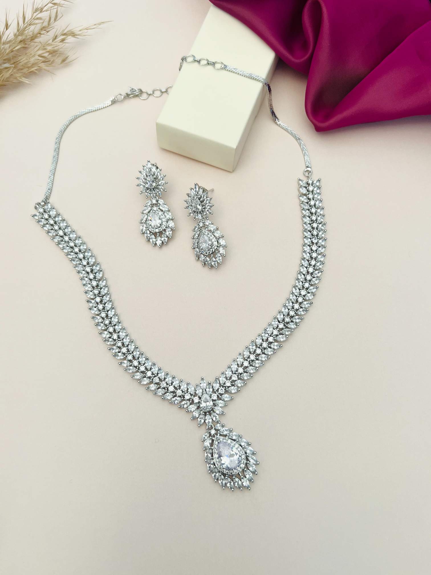 Silver Plated American Diamond Necklace Set by Abdesignsjewellery with matching earrings and intricate detailing