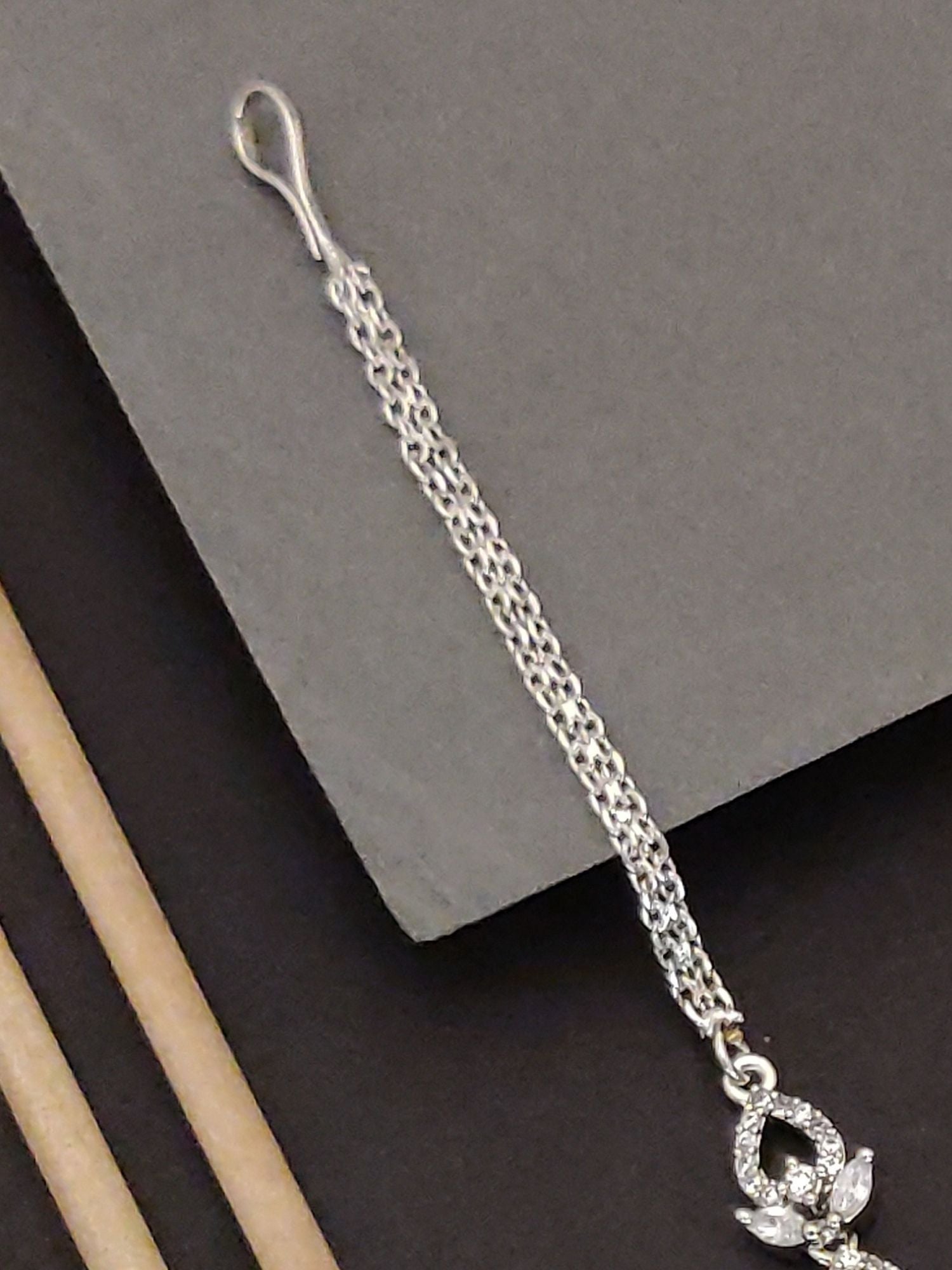 Silver Plated American Diamond Round MaangTikka with delicate chain and intricate design