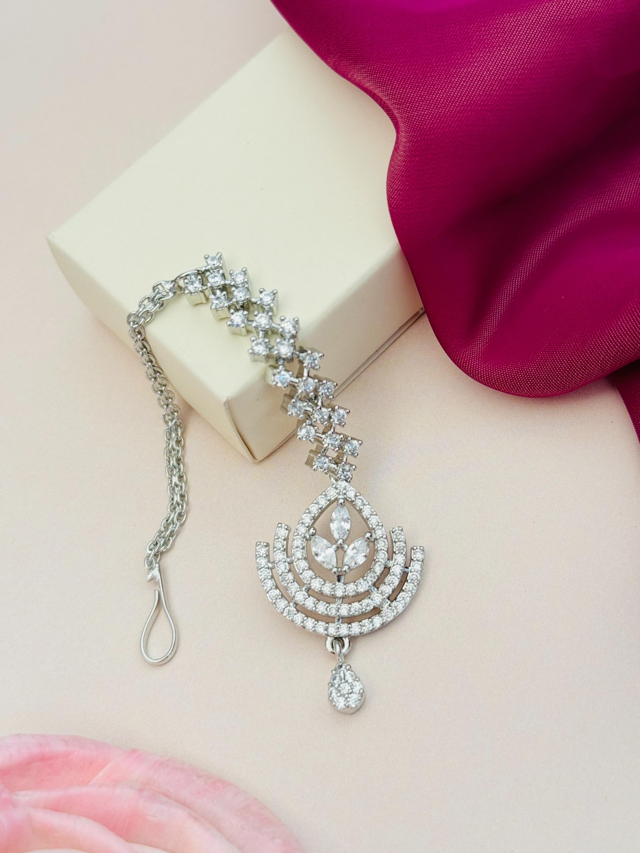 Elegant Silver Plated American Diamond Wedding Maangtikka with intricate design by Abdesignsjewellery