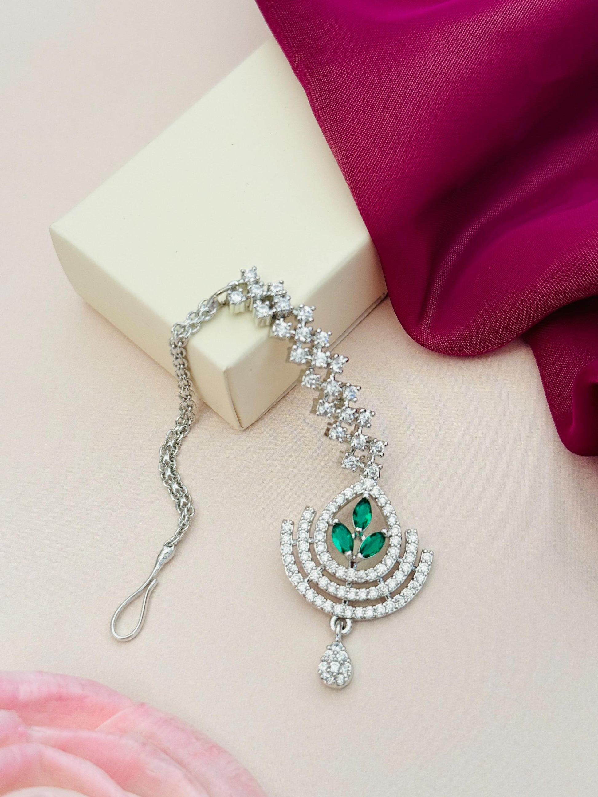 Silver Plated American Diamond Wedding Maangtikka green stones and intricate design by Abdesignsjewellery