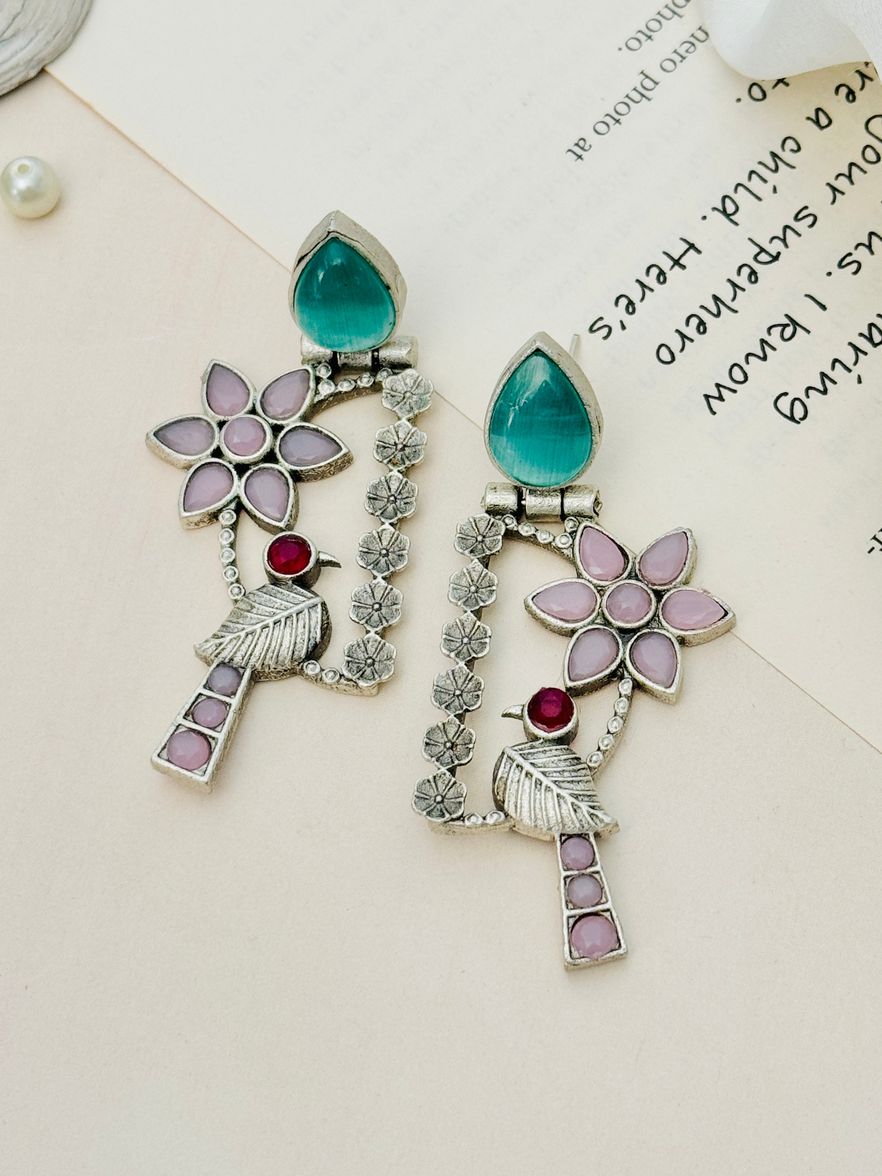 Silver Plated Bird Earrings by Abdesignsjewellery with colorful stones and floral design
