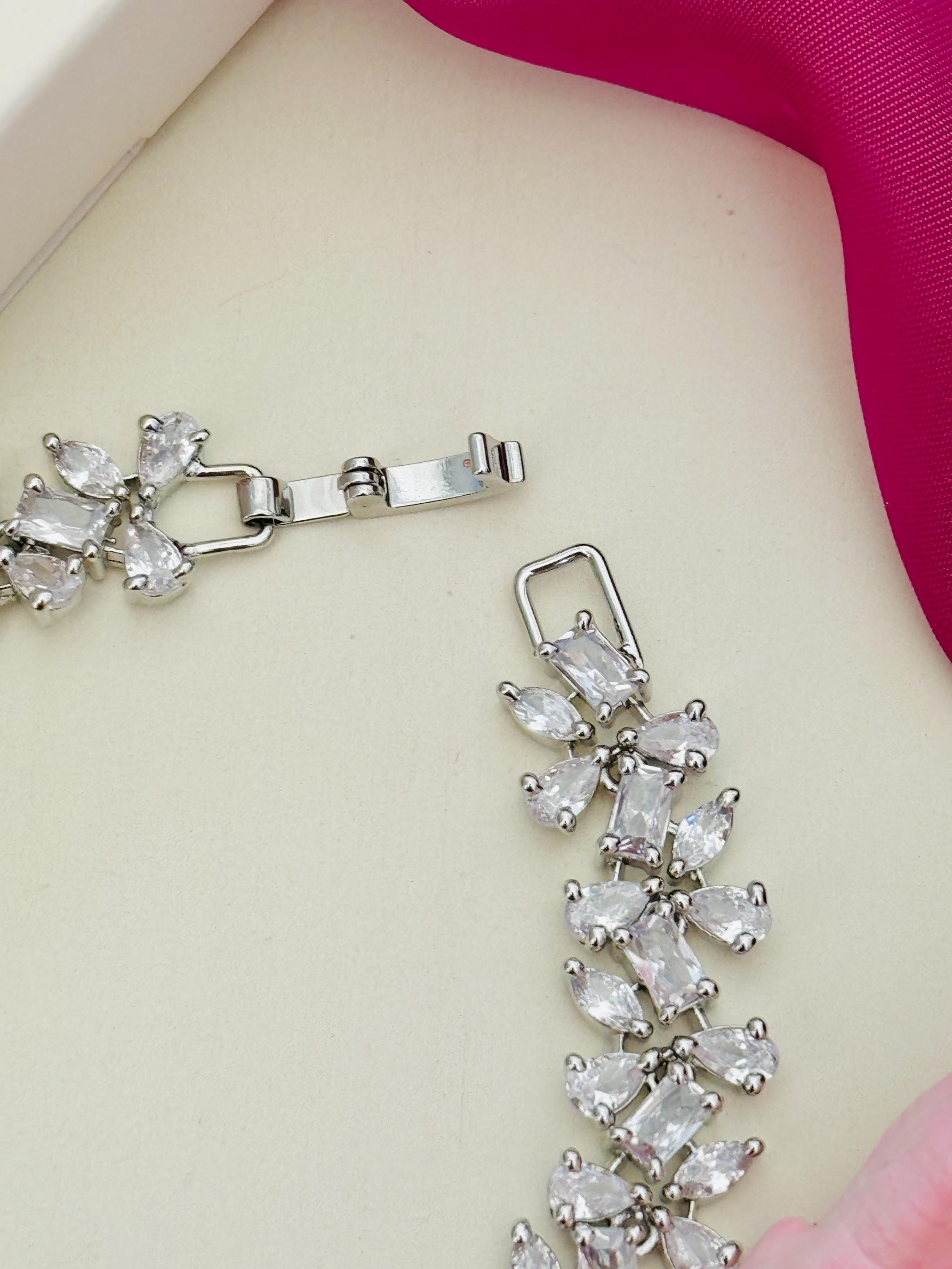 Silver Plated Cz Solitaire Hand Bracelet with sparkling cubic zirconia stones and sturdy clasp by Abdesignsjewellery