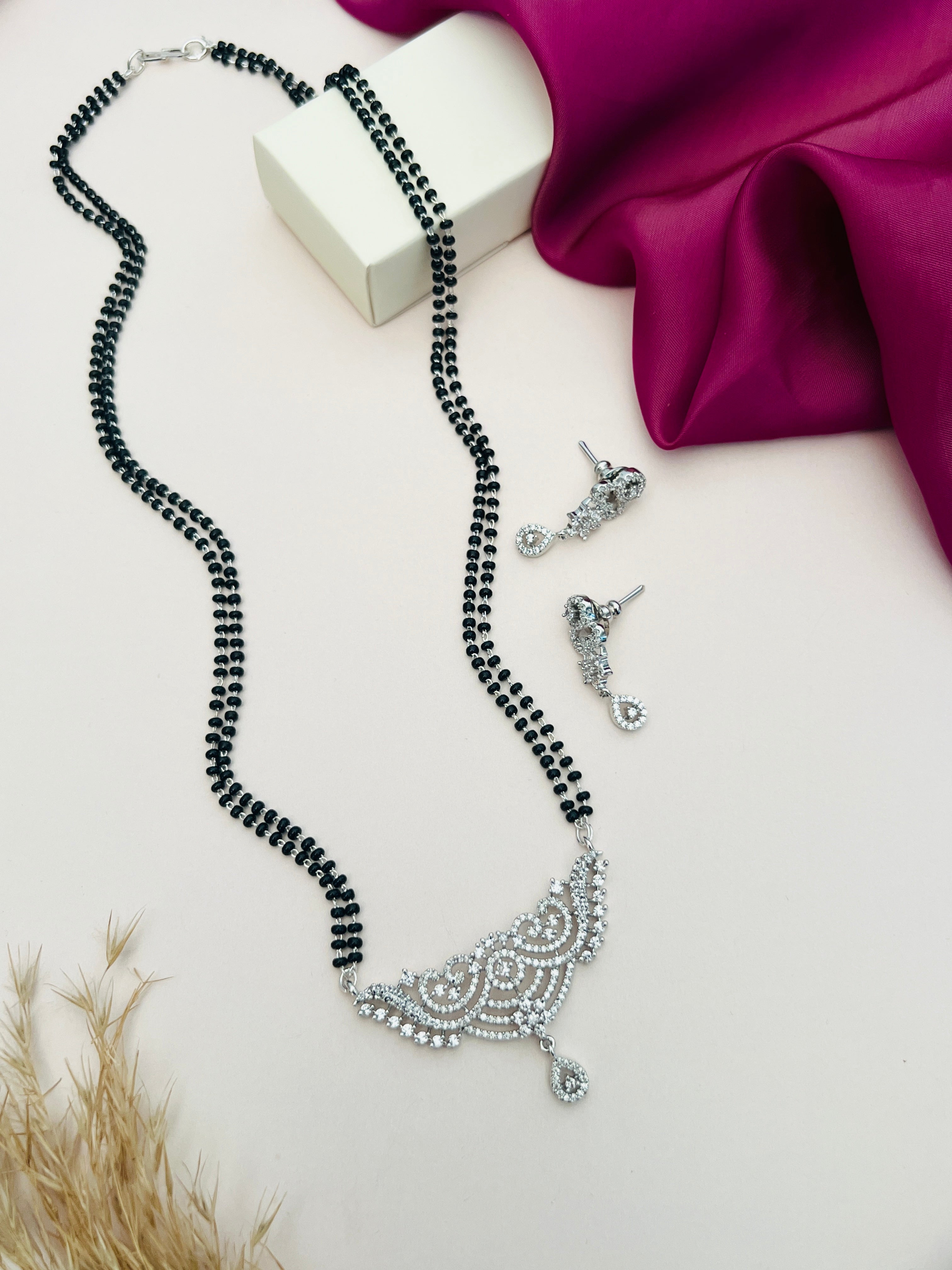 Silver Plated Long Peacock Mangalsutra Set with black beads and matching earrings by Abdesignsjewellery