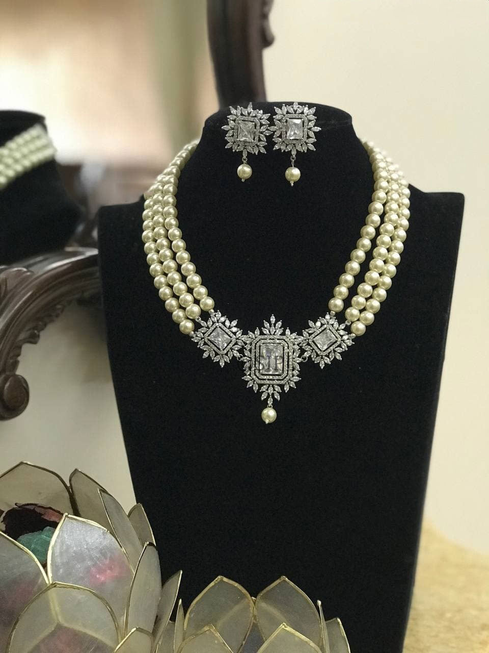 Silver Plated Pearl Choker Diamond Necklace Set with three strands of pearls and intricate diamond design by Abdesignsjewellery