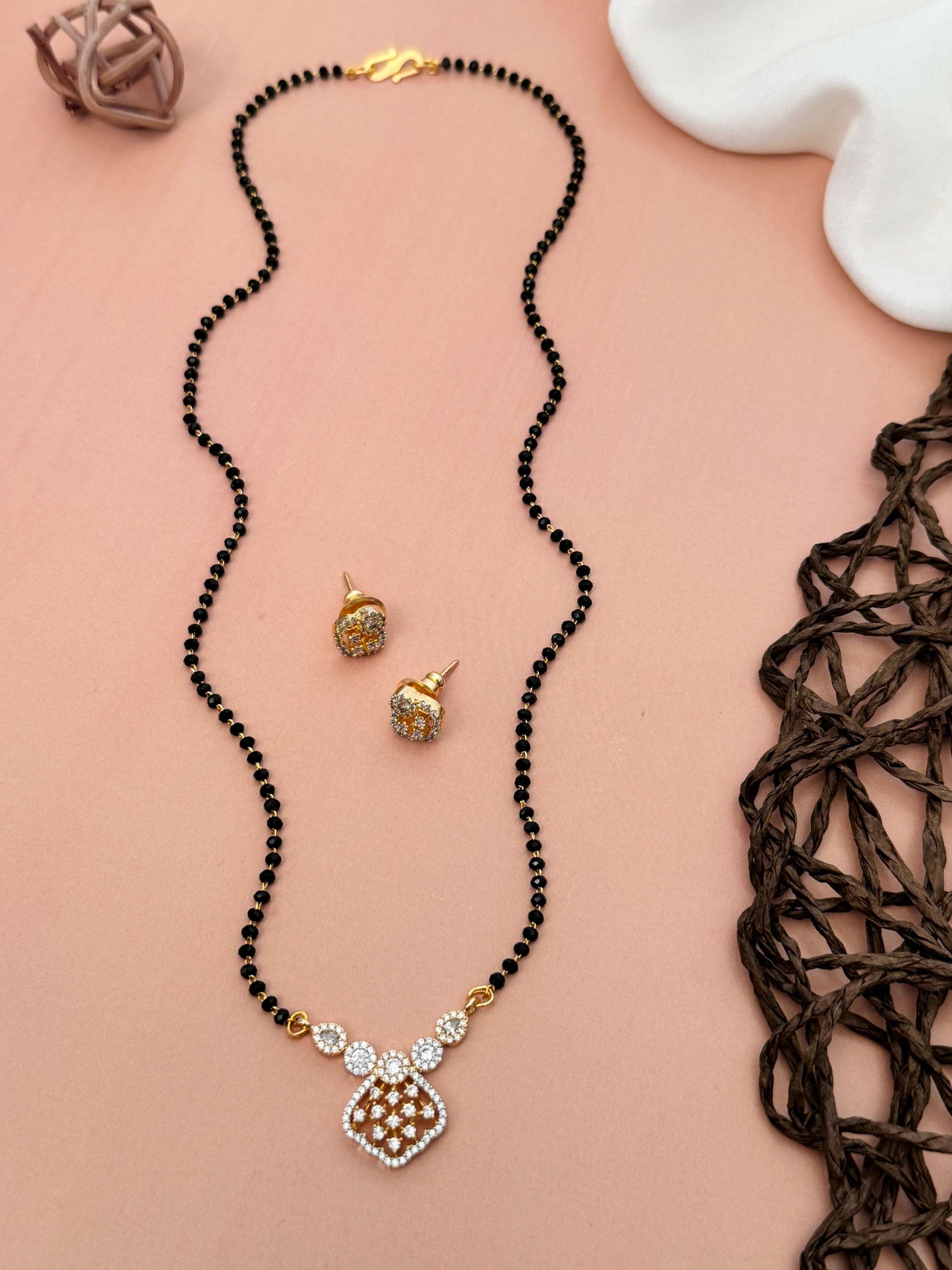 Solitaire American Diamond Mangalsutra Set by Abdesignsjewellery with black beads and gold detailing