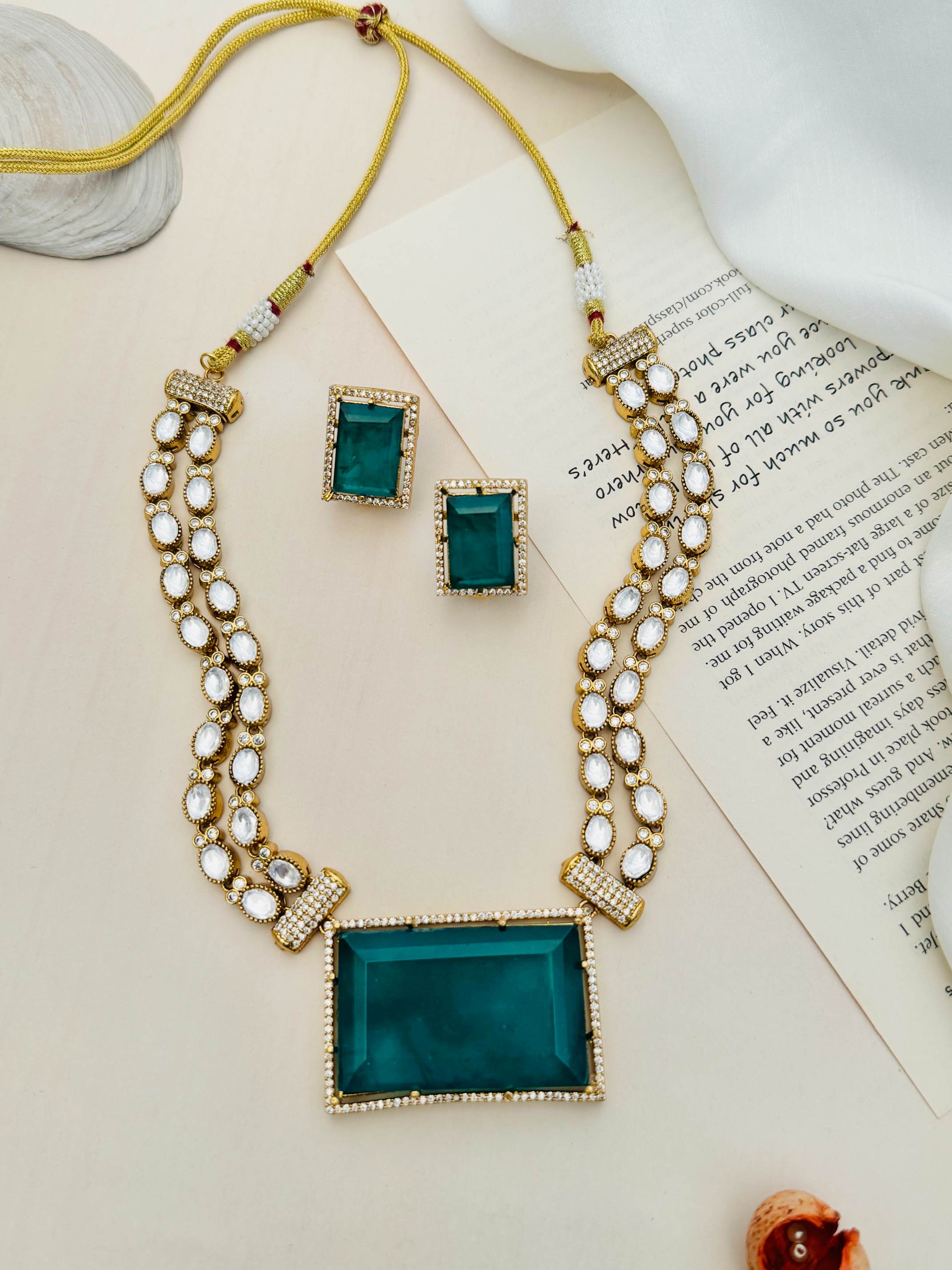 Sophisticated Gold Plated Polki Bridal Necklace with white stones and green rectangular centerpiece from Abdesignsjewellery