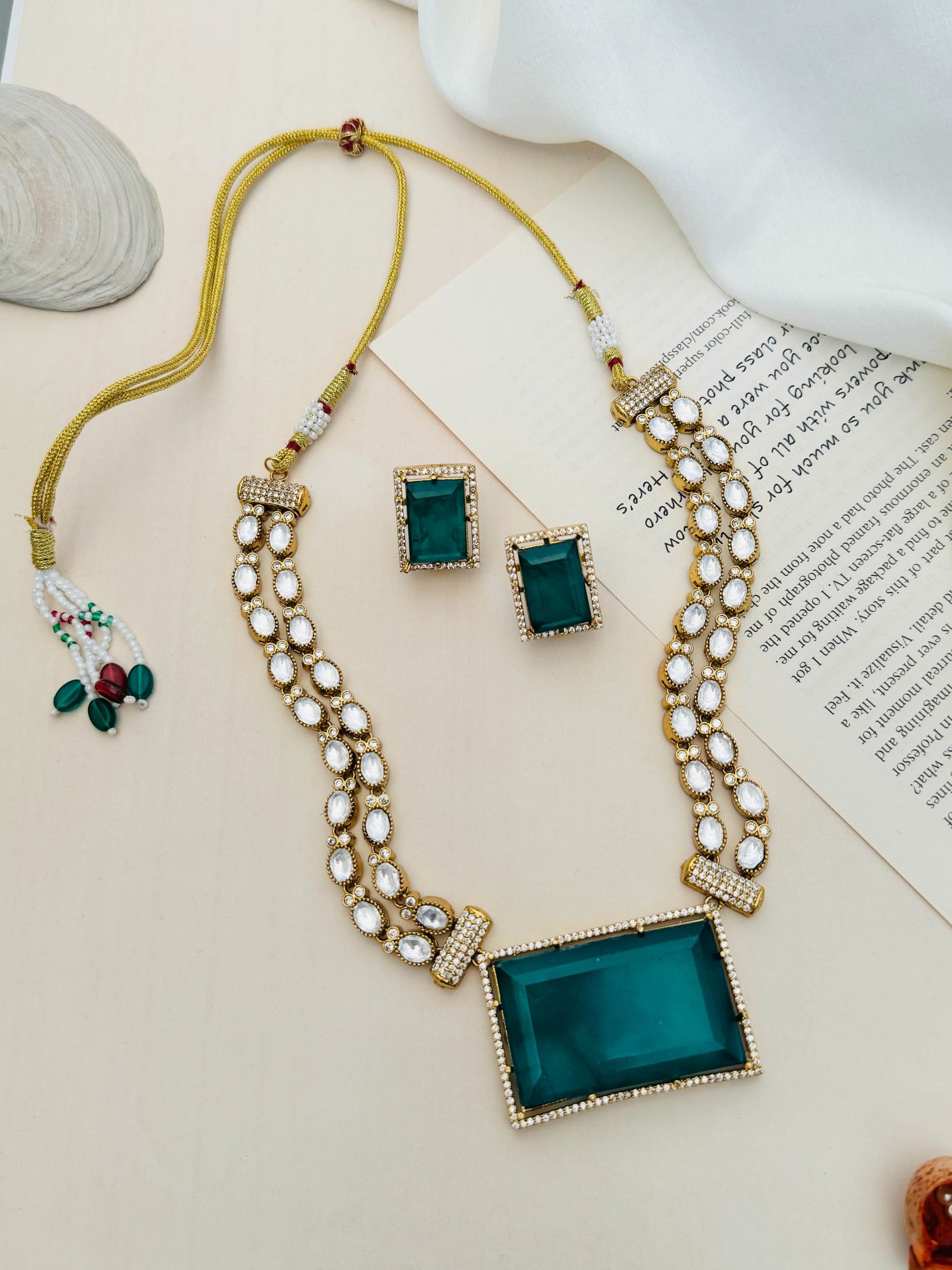 Sophisticated Gold Plated Polki Bridal Necklace with large green stones and matching earrings by Abdesignsjewellery