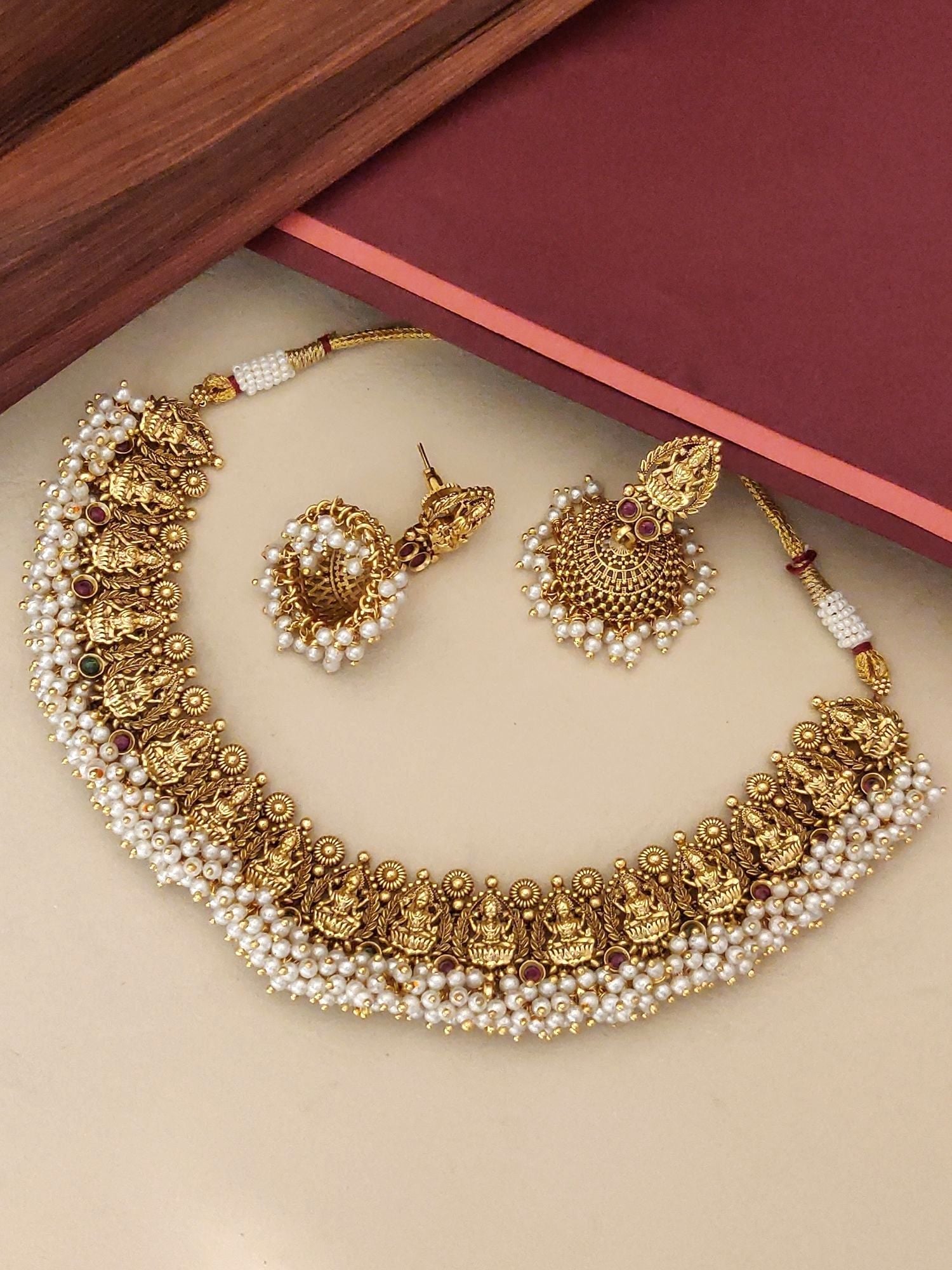 South Indian antique temple necklace with pearl detailing and matching earrings from Abdesignsjewellery