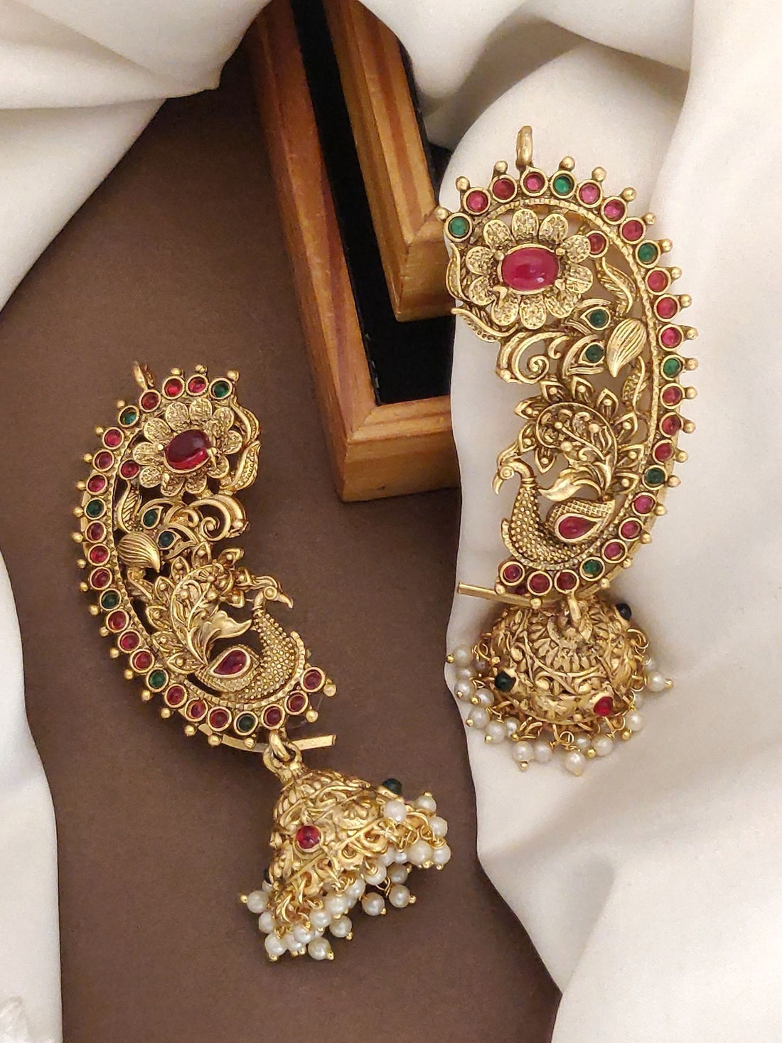 Beautiful South Indian gold plated ear cuffs with intricate designs and colorful gemstones