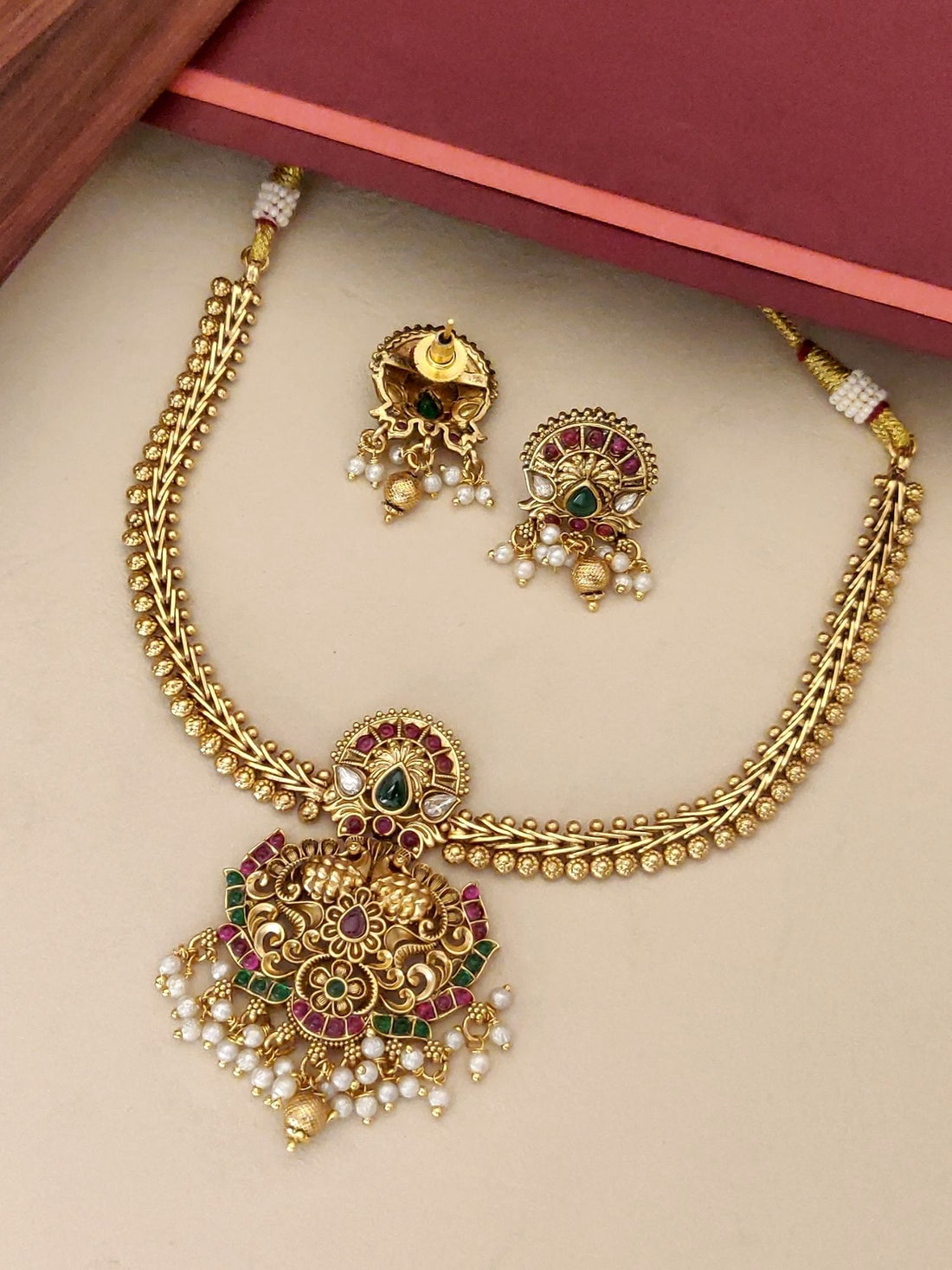Abdesigns South Indian Peacock Necklace Set with intricate gold design and pearl accents