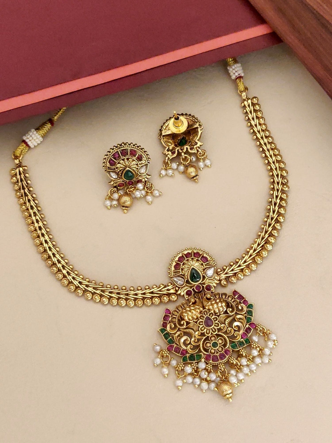 Abdesigns South Indian Peacock Necklace Set with intricate gold design and pearl accents