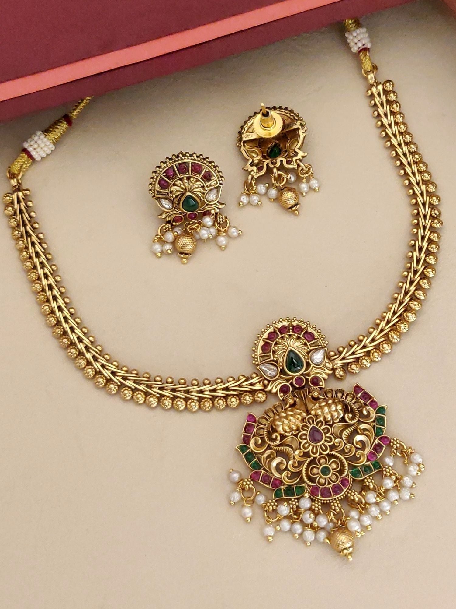 Abdesignsjewellery South Indian Peacock Necklace Set with intricate gold design and pearl accents