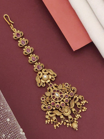 South Indian Style Gold Plated Maangtikka with intricate design and colorful embellishments for traditional occasions