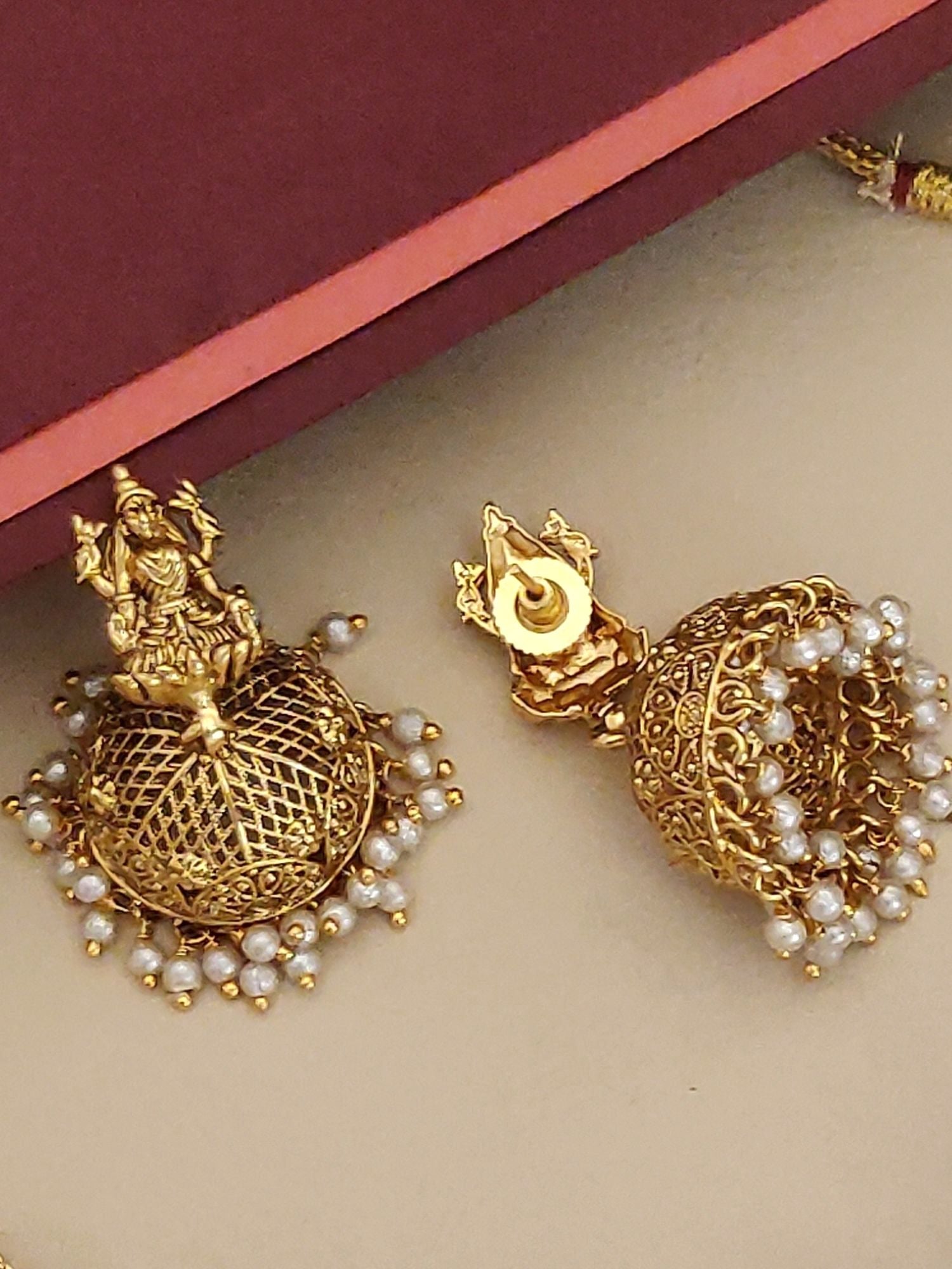 Southindian Temple Antique Elephant Necklace featuring intricate gold work and pearl embellishments