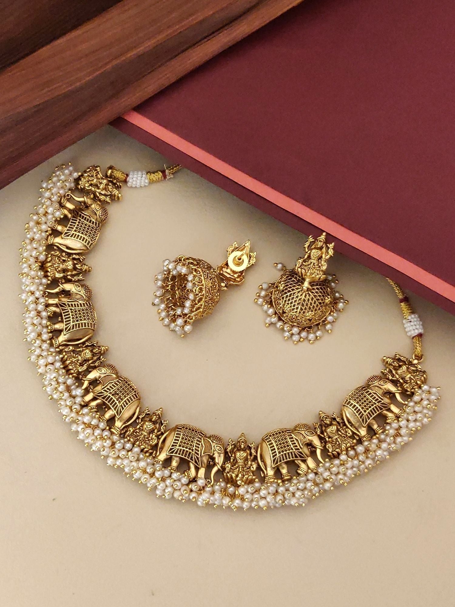Abdesignsjewellery Southindian Temple Antique Elephant Necklace adorned with intricate designs and pearls