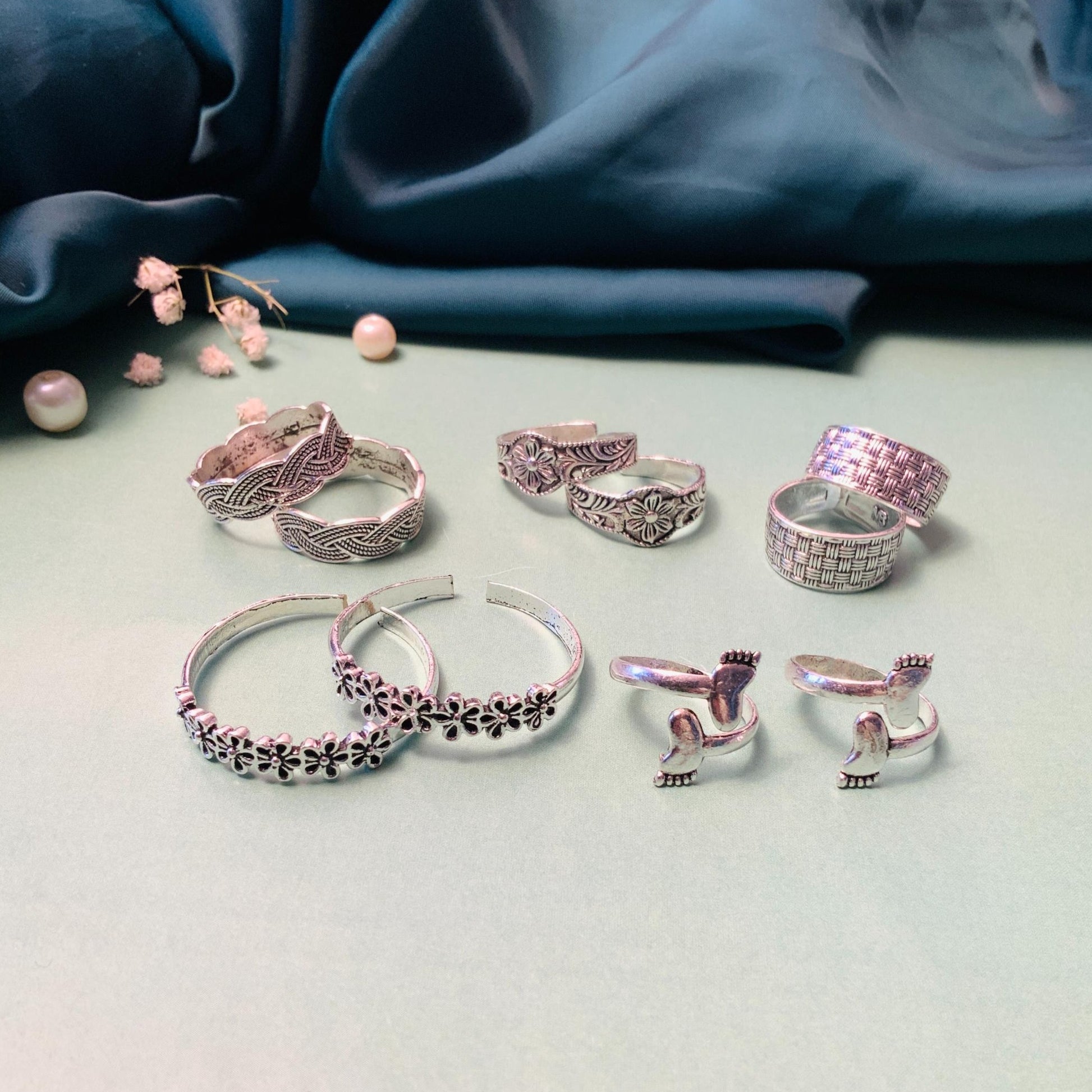 Set of silver toe rings from Abdesignsjewellery featuring various intricate designs