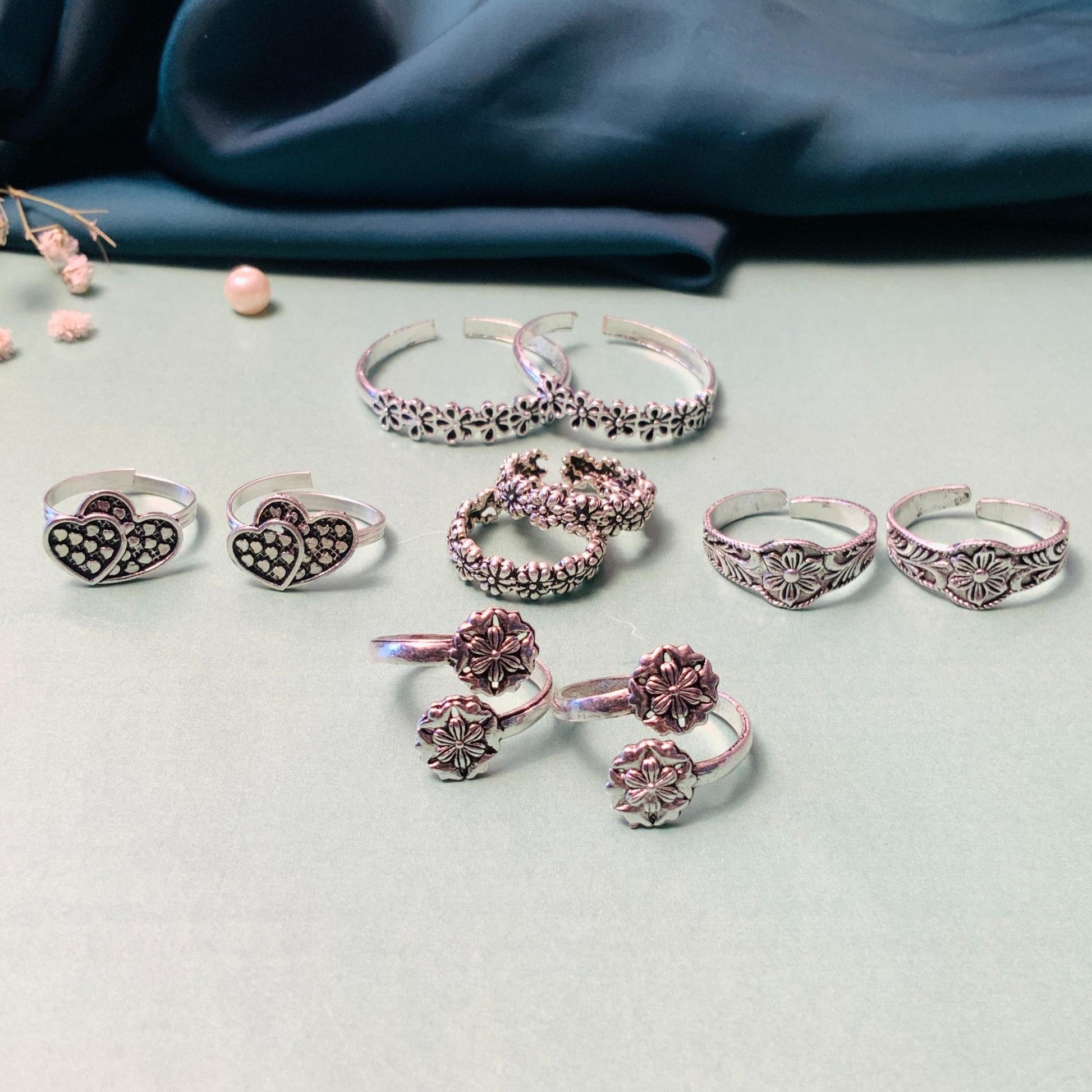 Set of stylish toe rings from Abdesignsjewellery featuring floral and heart designs