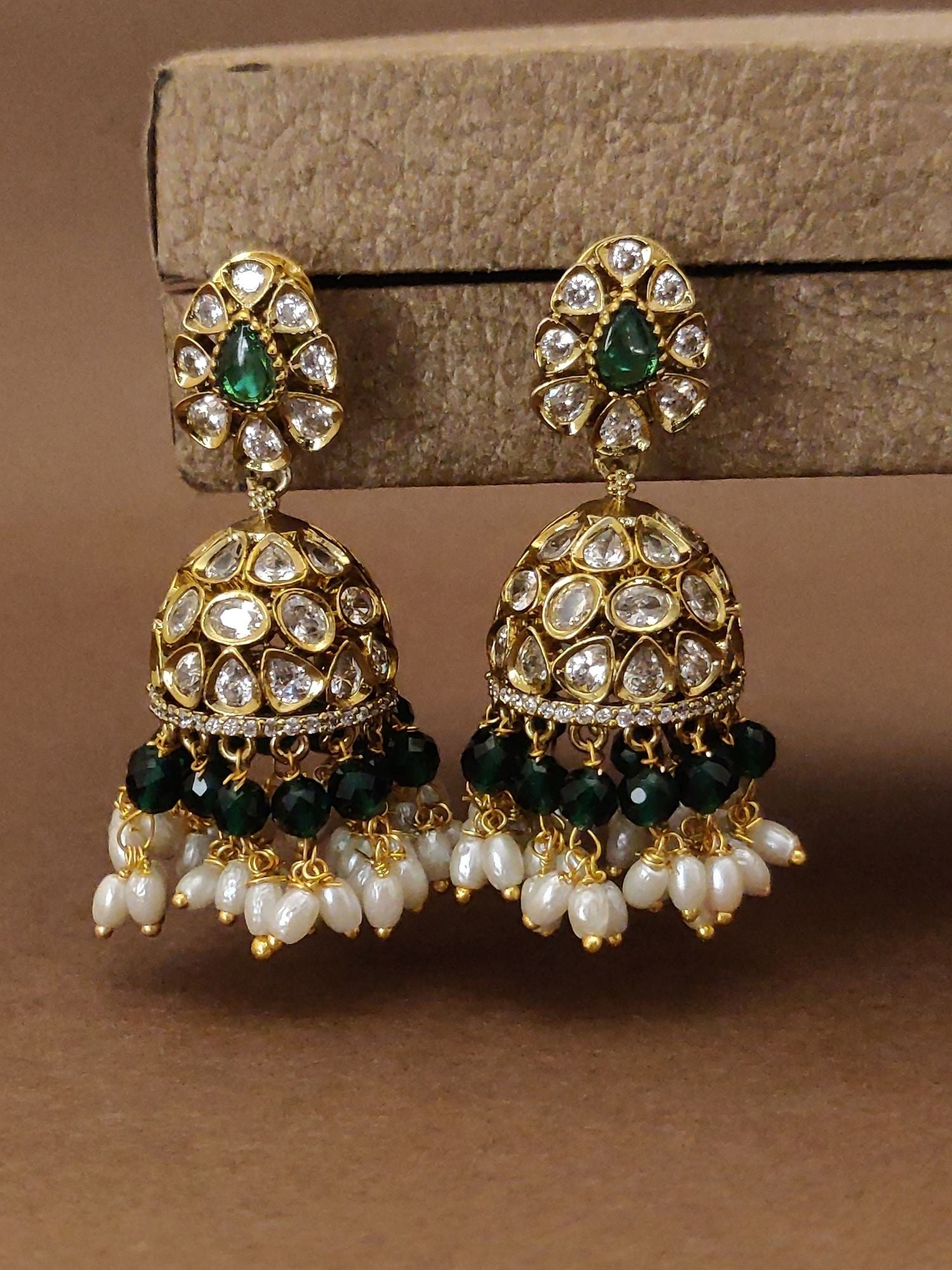 Traditional south Indian wedding earrings with green stones and pearl detailing by Abdesignsjewellery
