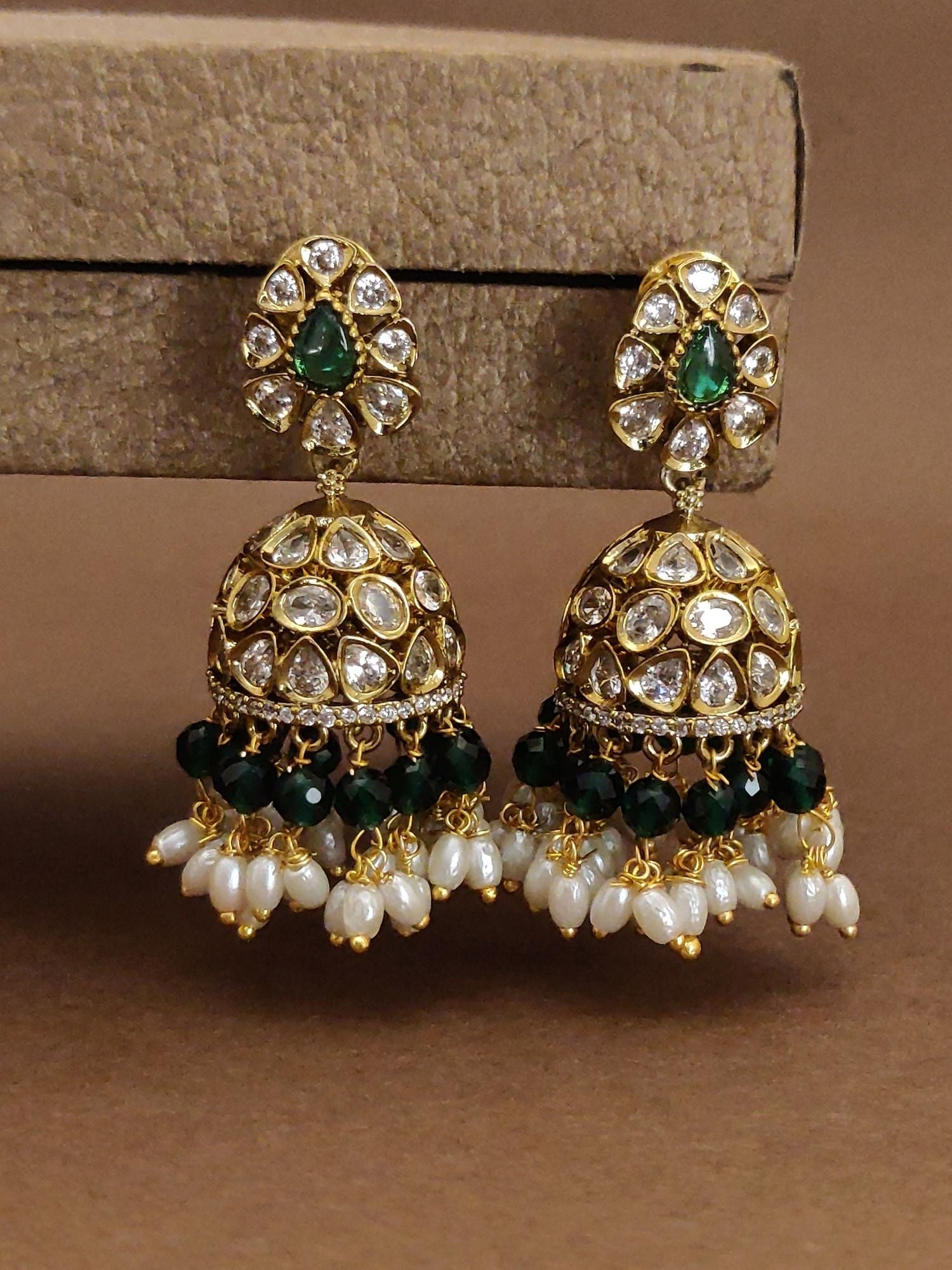 Traditional South Indian wedding earrings with gold finish green stones and pearl drops by Abdesignsjewellery