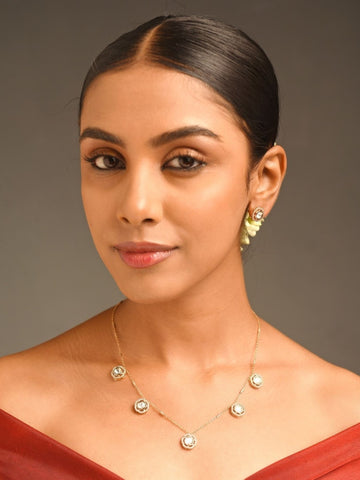 Unique Gold Plated Uncut Polki Pendant Chain worn by woman with elegant design and delicate gold finish
