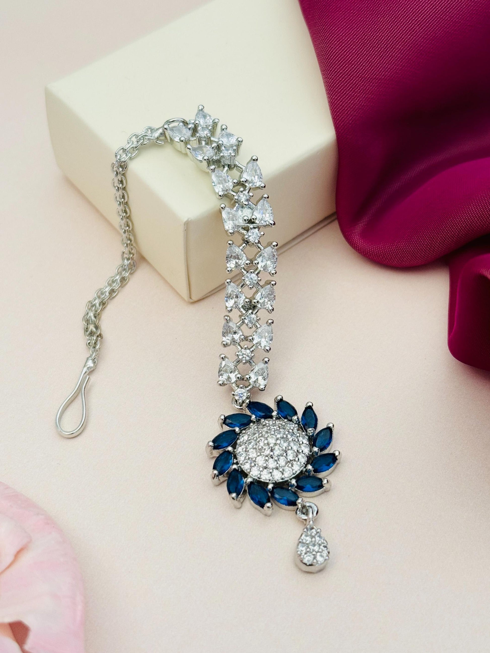 Unique Silver Plated American Diamond Maangtikka with blue stones and intricate design by Abdesigns